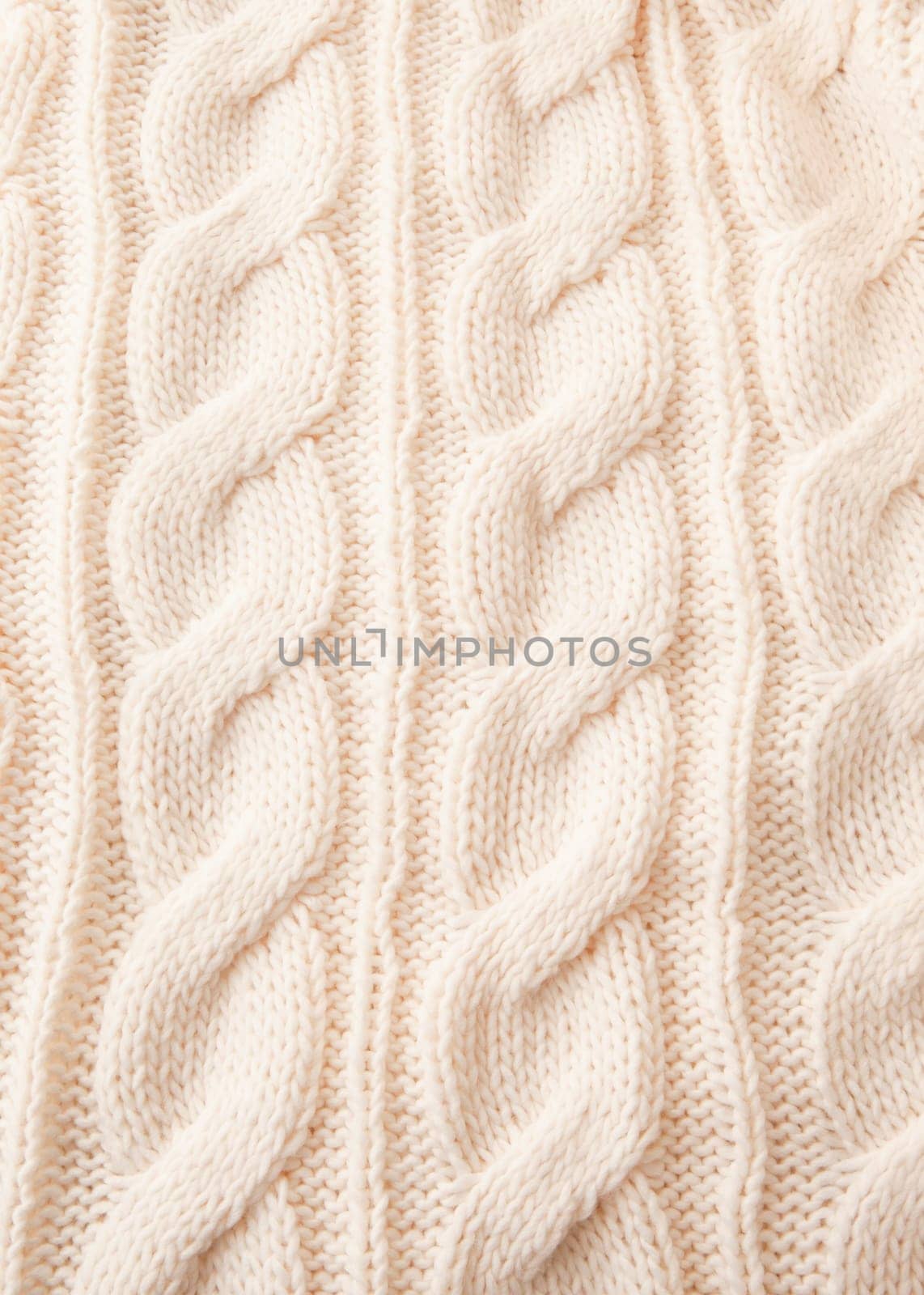 Knitted braid pattern in wool white as background with text space