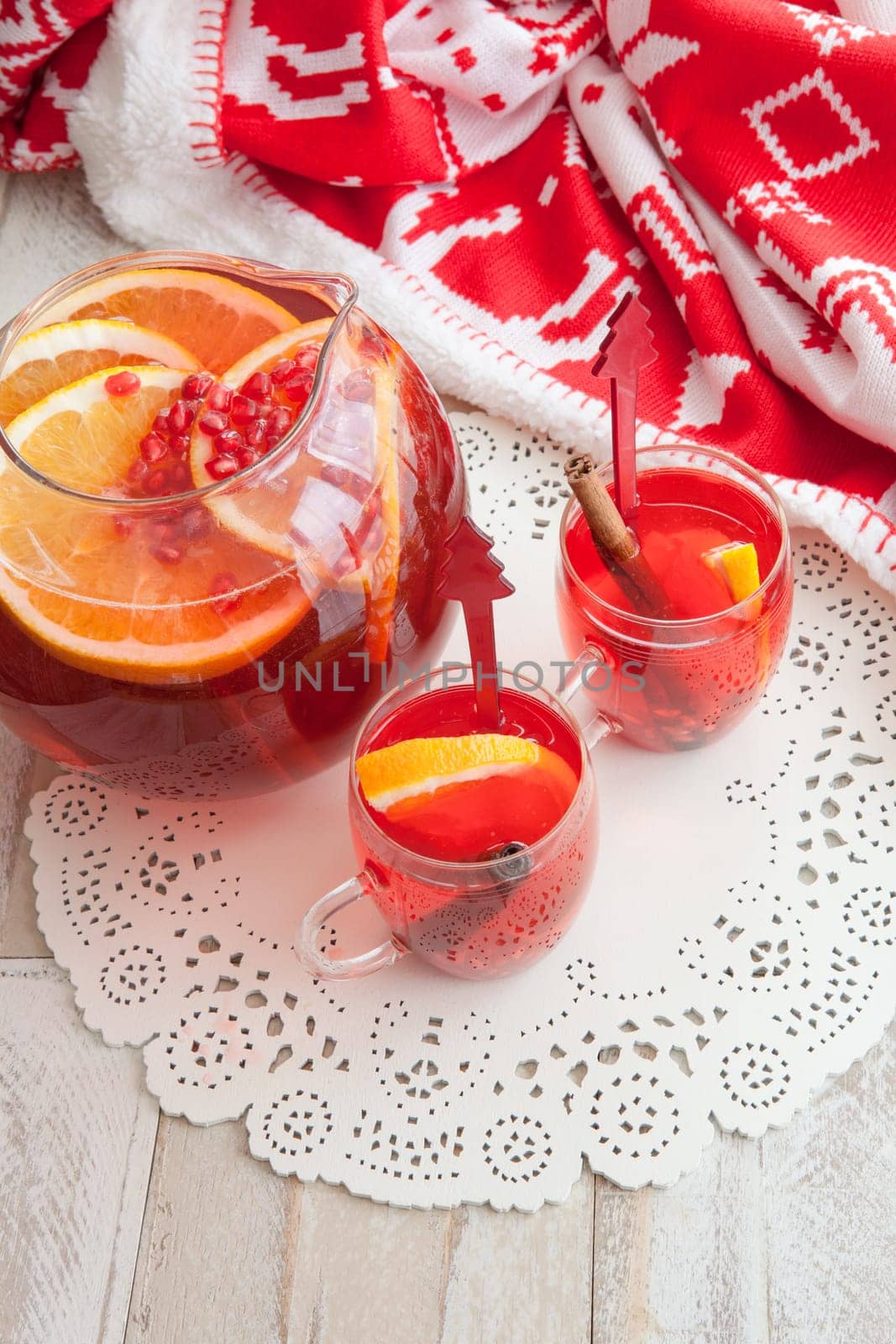 Hot punch with orange,cinnamon and pomegranate