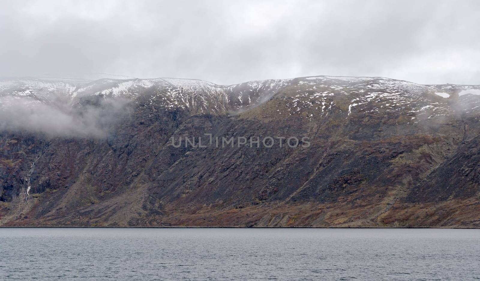 Fog and Fresh Snow on the Coastal Cliffs near Pangnirtung, Nunavut, Canada