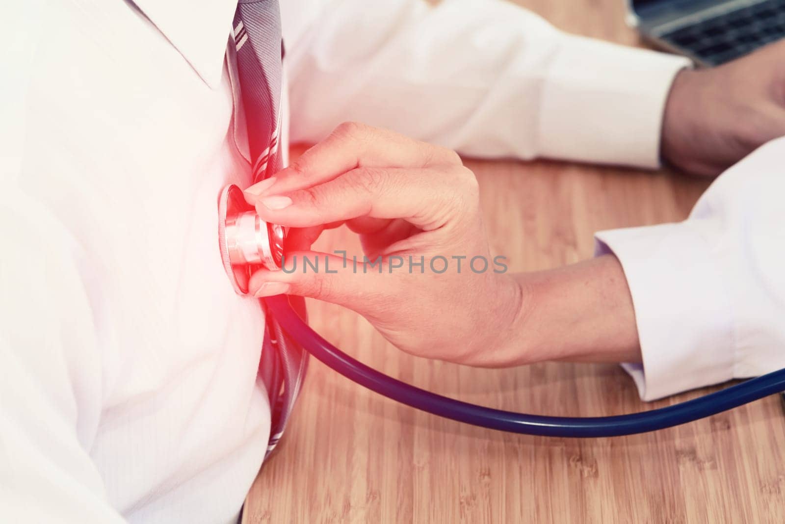 doctor hand holding stethoscope in front of patient chest, listen heartbeat, healthcare concept