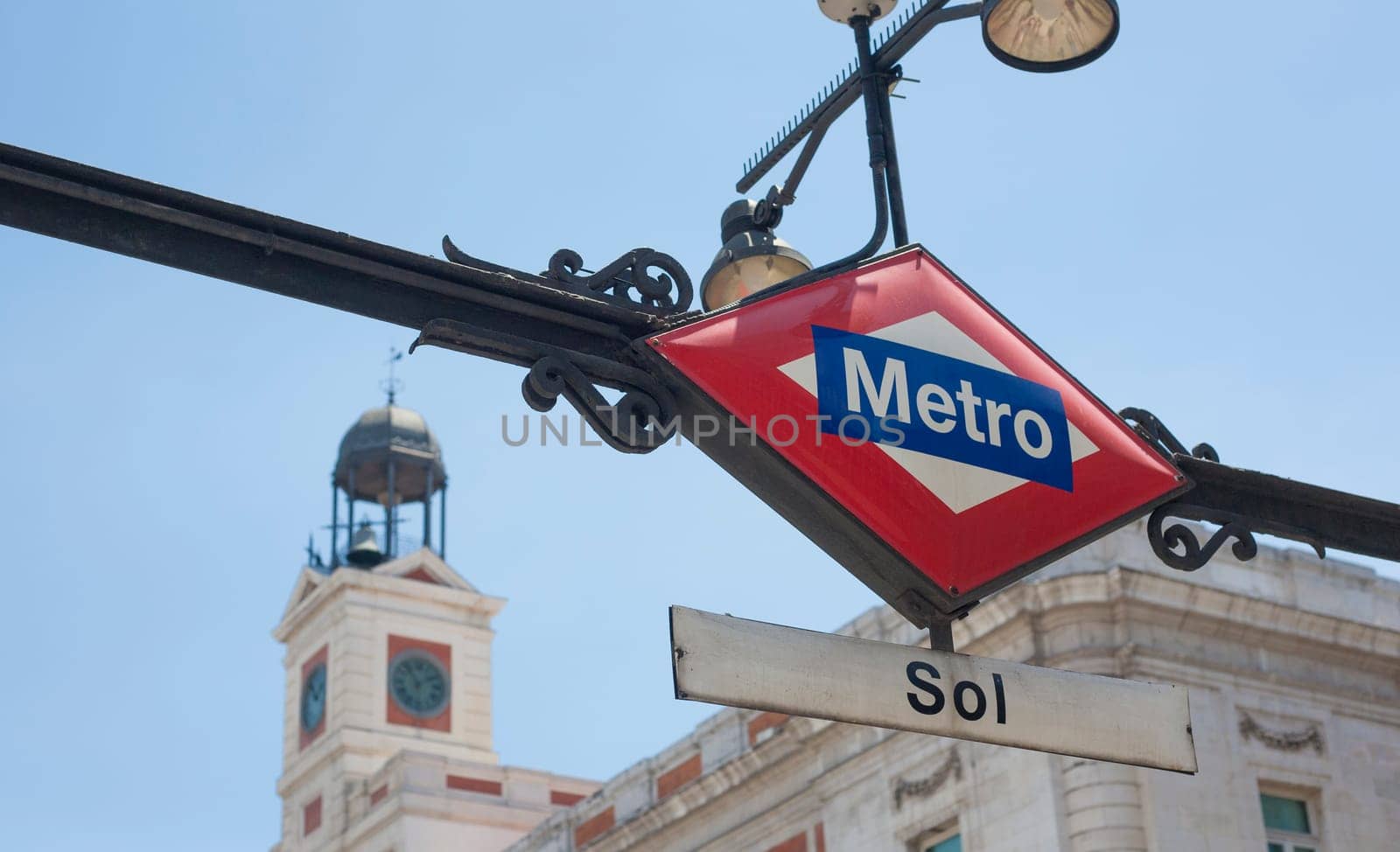 Subway Station Entrance Sign in Madrid, Spain. Sol