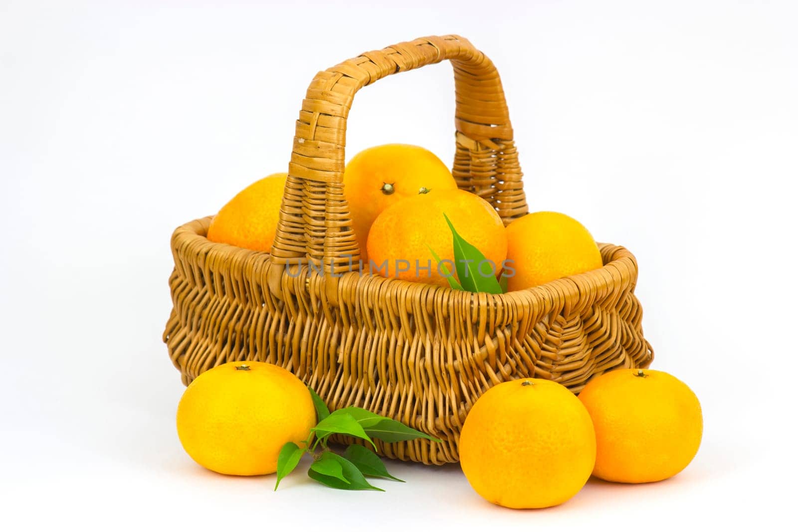 tangerines in a basket on white background