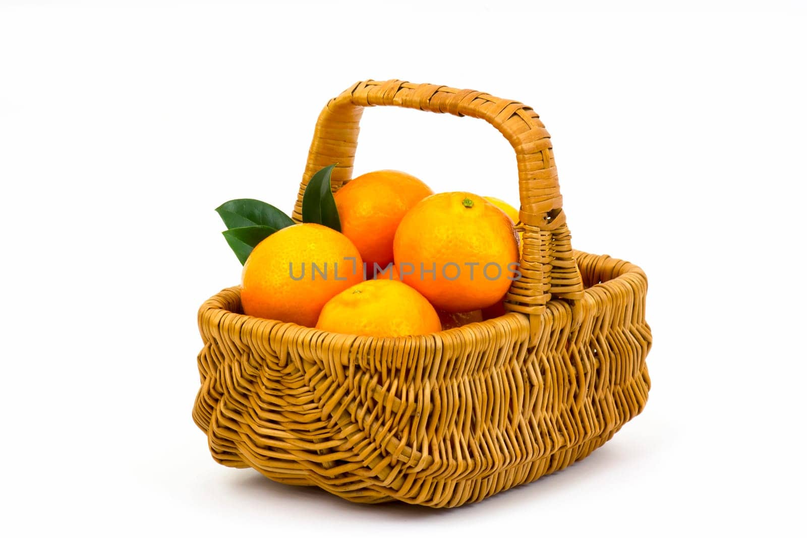 tangerines in a basket on white background