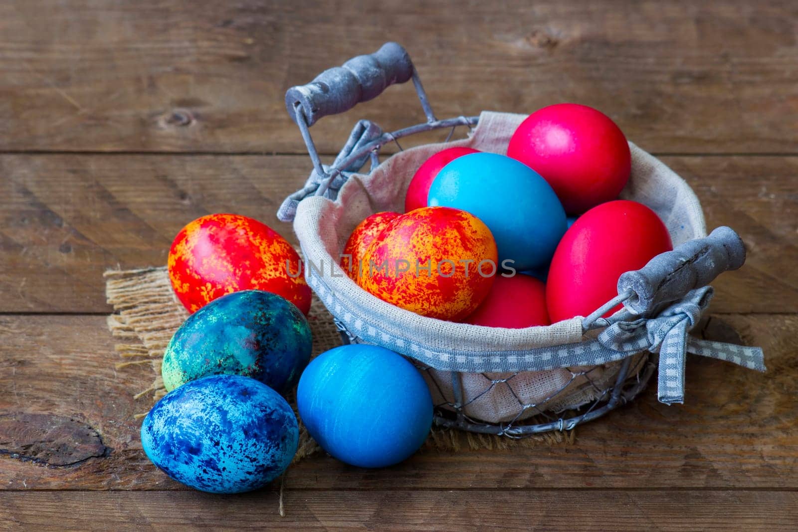 Happy Easter, colorful eggs in a basket
