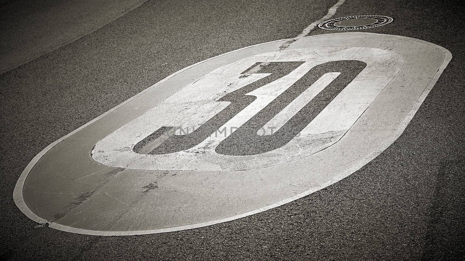 Speed limit on the asphalt of a road in Germany