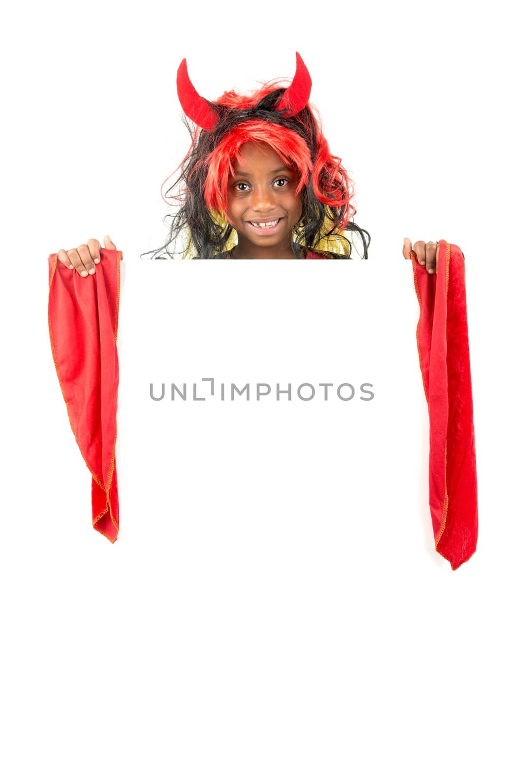 Girl with Halloween costume over a white board