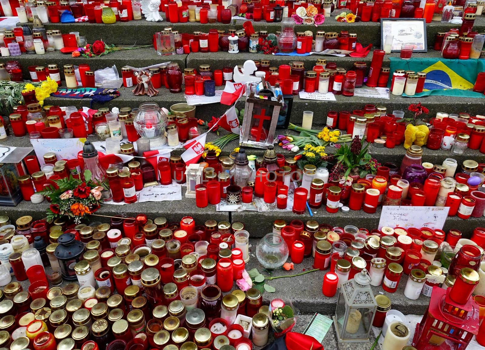 Mourning candles at Berlin's Breitscheidplatz in Berlin to commemorate the terrorist attack on the Christmas market at the Memorial Church. In the attack on December 19,2016,the Islamist assassin Anis Amri shot the Polish freight forwarder of a semitrailer,robbed the truck and drove him into a crowd at the Christmas market around 8 p.m.