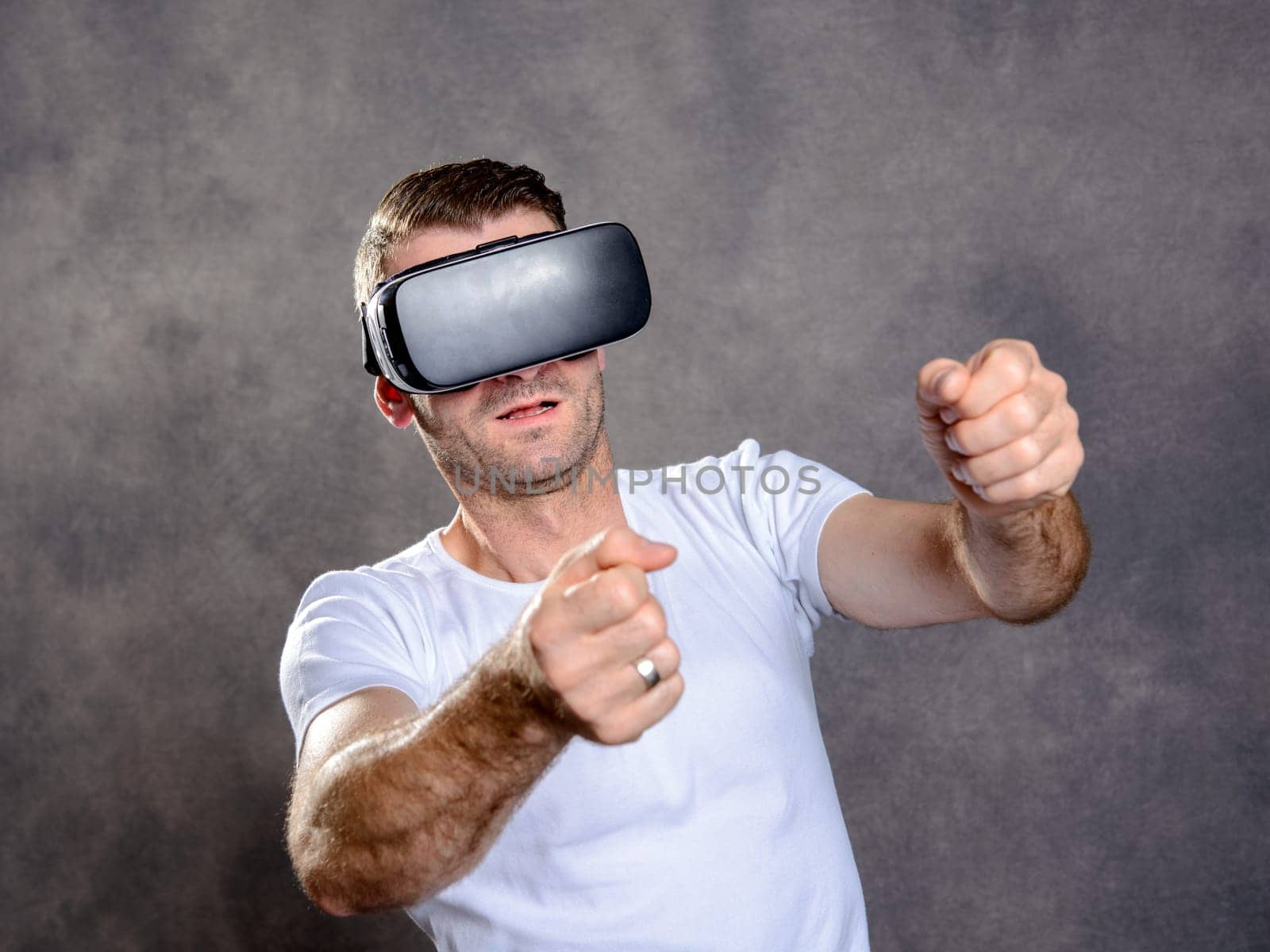young man have fun with virtual reality glasses
