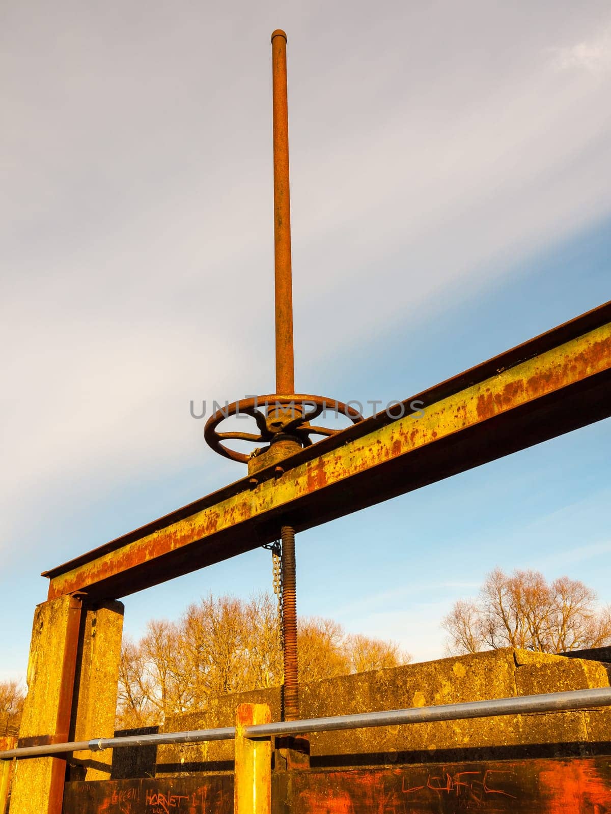 close up of old waterworks wheel bridge damn  essex  england  uk