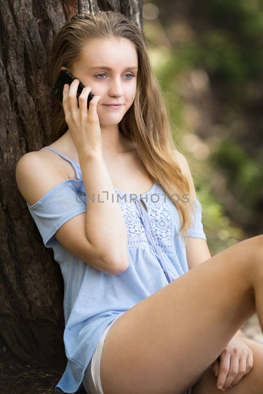 Teenage girl talking on cell phone