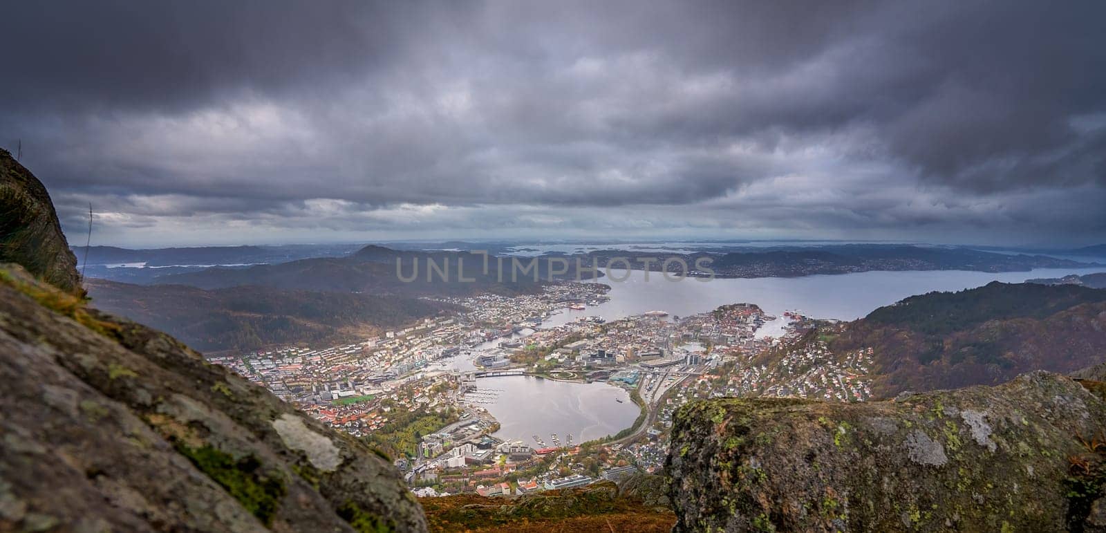 Panoramic view of Bergen town on a cloudy day as seen from the top of Mount Ulriken, Norway