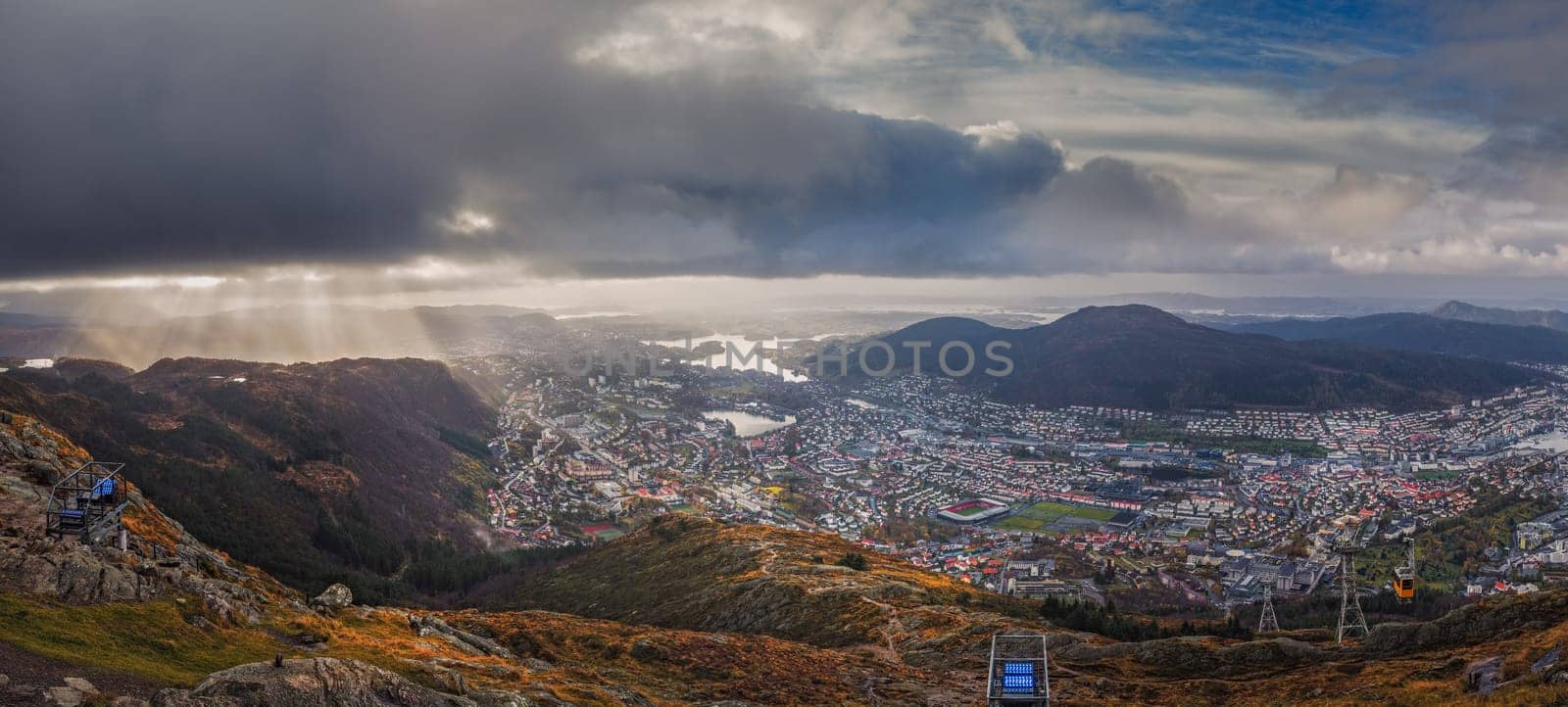 Panoramic view of Bergen town on a cloudy day as seen from the top of Mount Ulriken, Norway