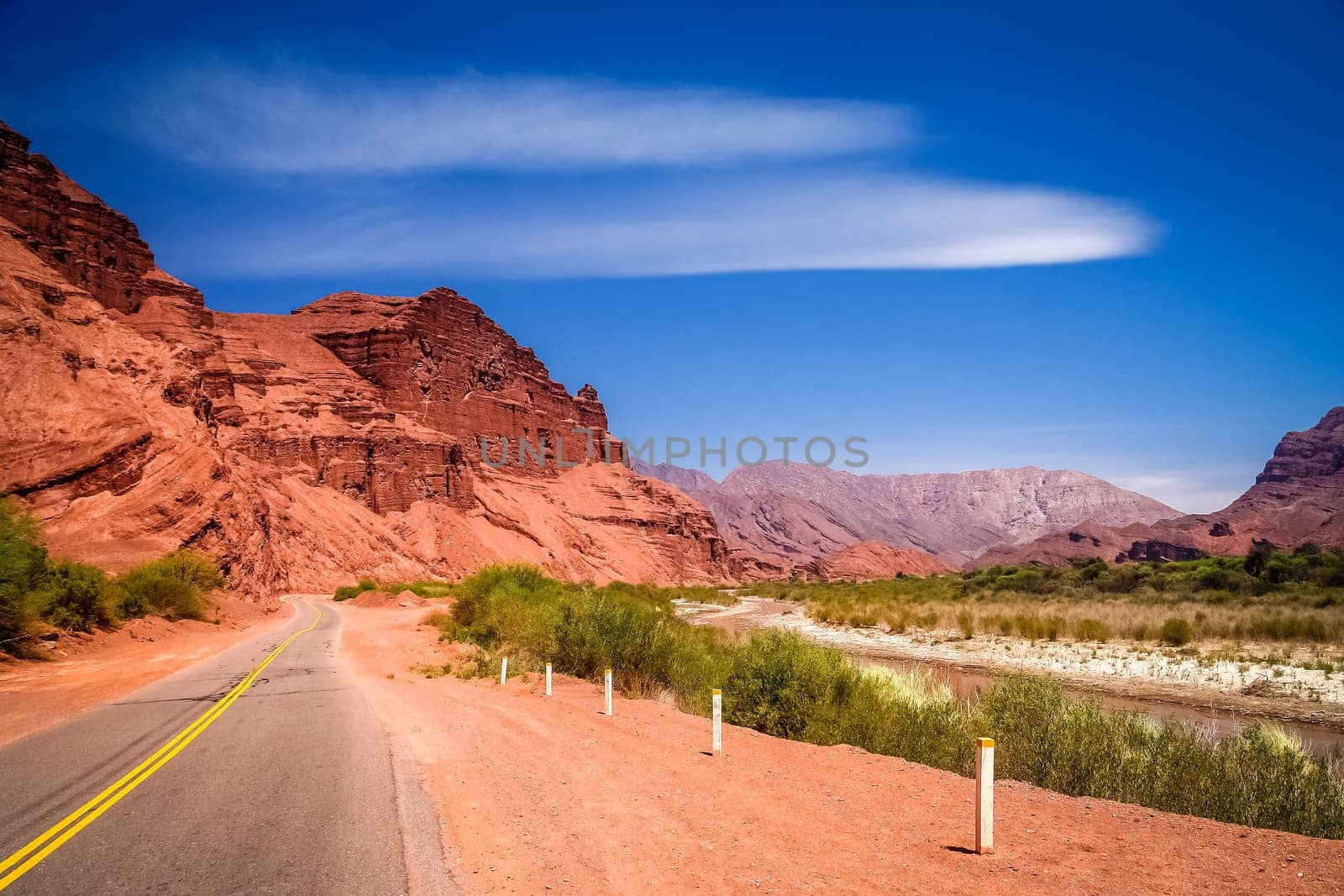 Road through colourful polychromic mountains in Northern Argentina