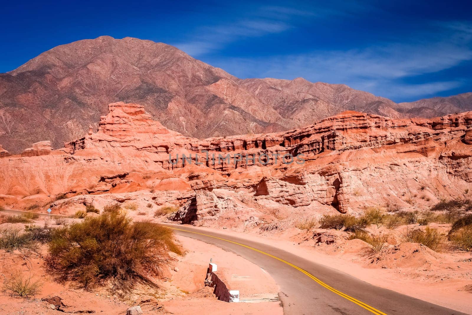 Road through colourful polychromic mountains in Northern Argentina
