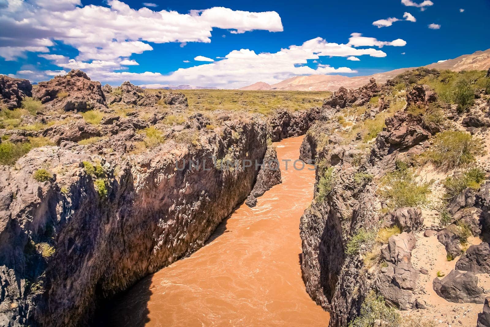 Rio Grande river flowing through very narrow canyon in northern Argentina