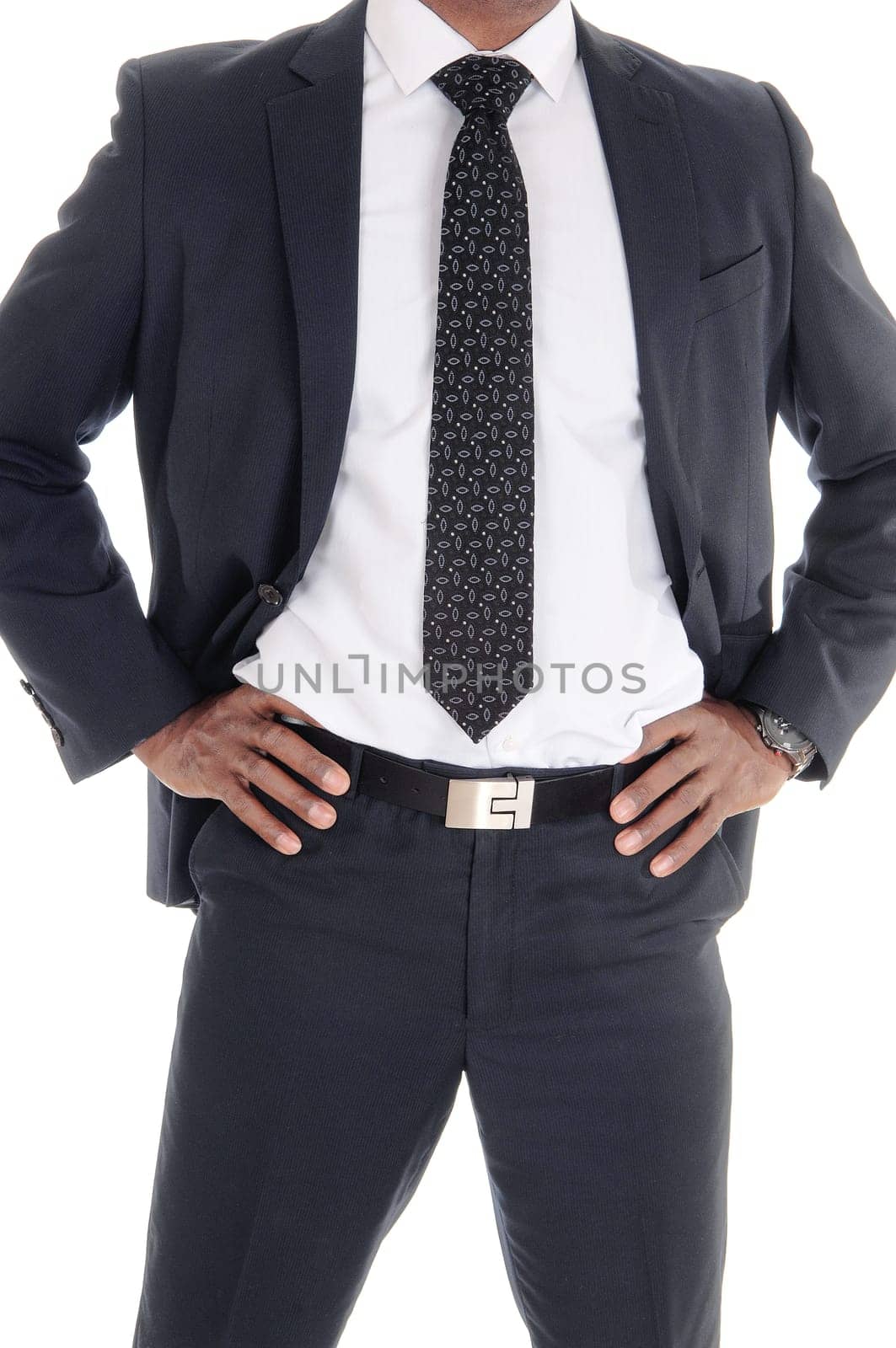 A close up image of the middle section on a tall handsome African.American man in suit and tie, isolated for white background.