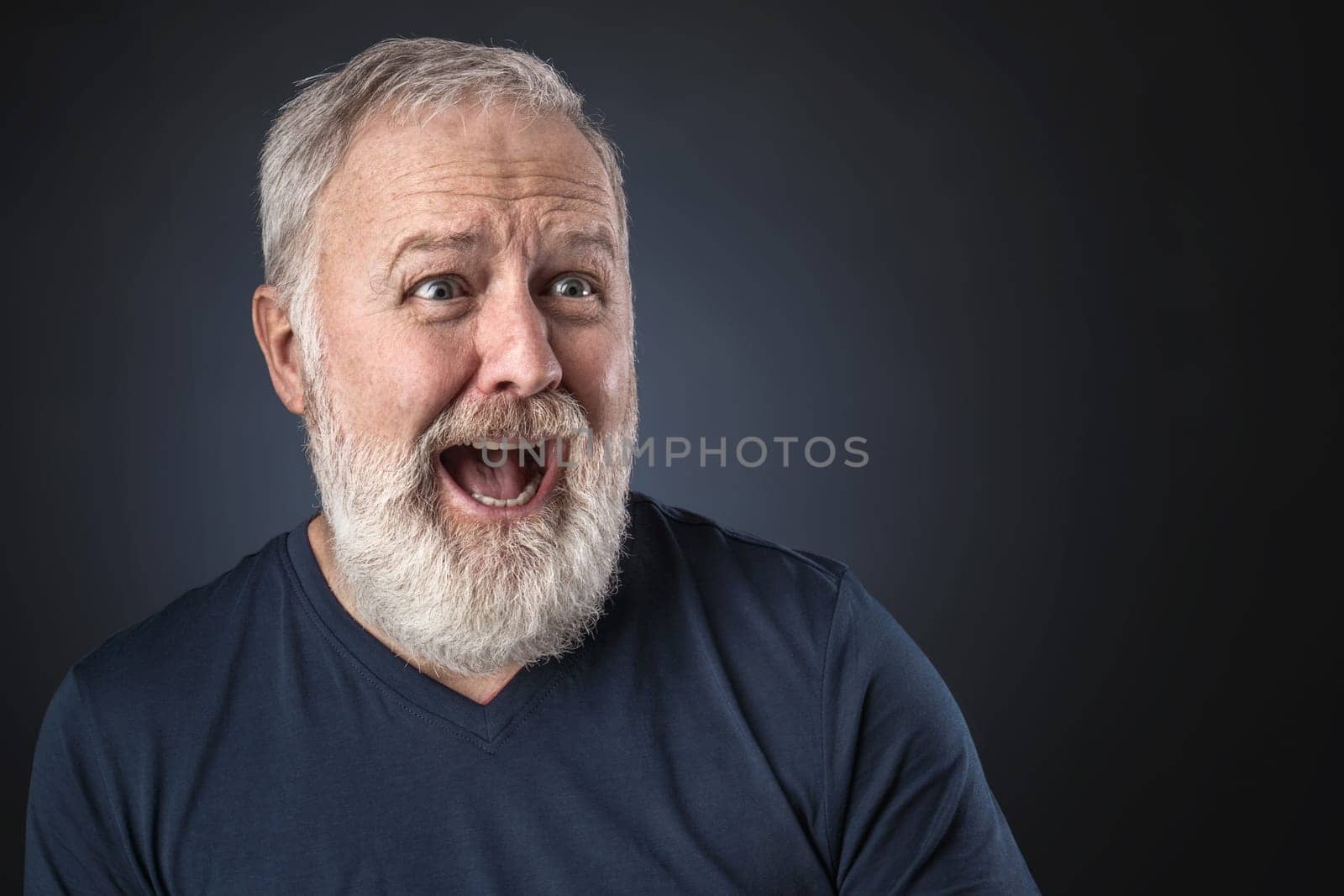 Old man in shirt and scared looking a way