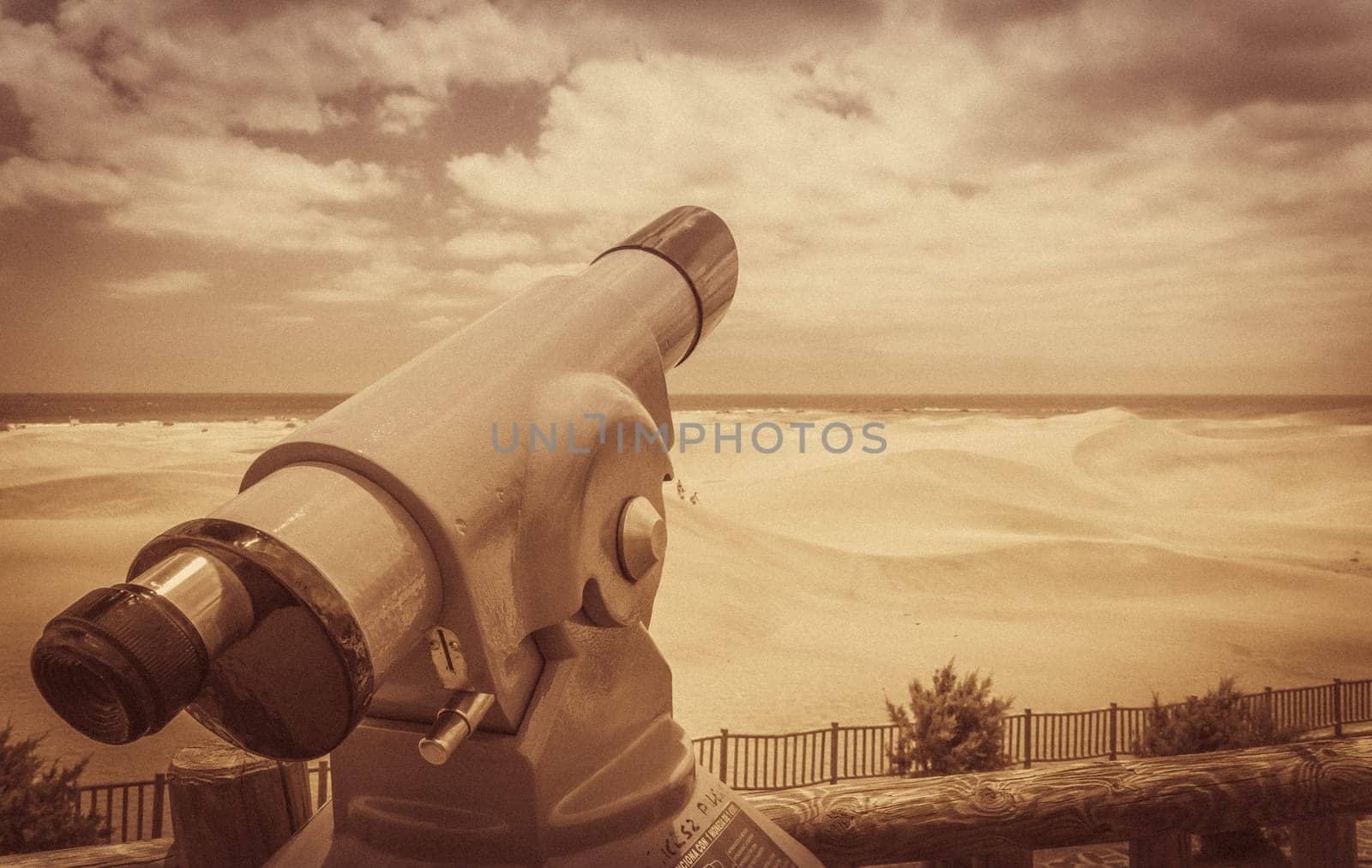 Telescope on the lookout of the sand dunes in  the Natural Reserve of Dunes of Maspaloma in Gran Canaria
