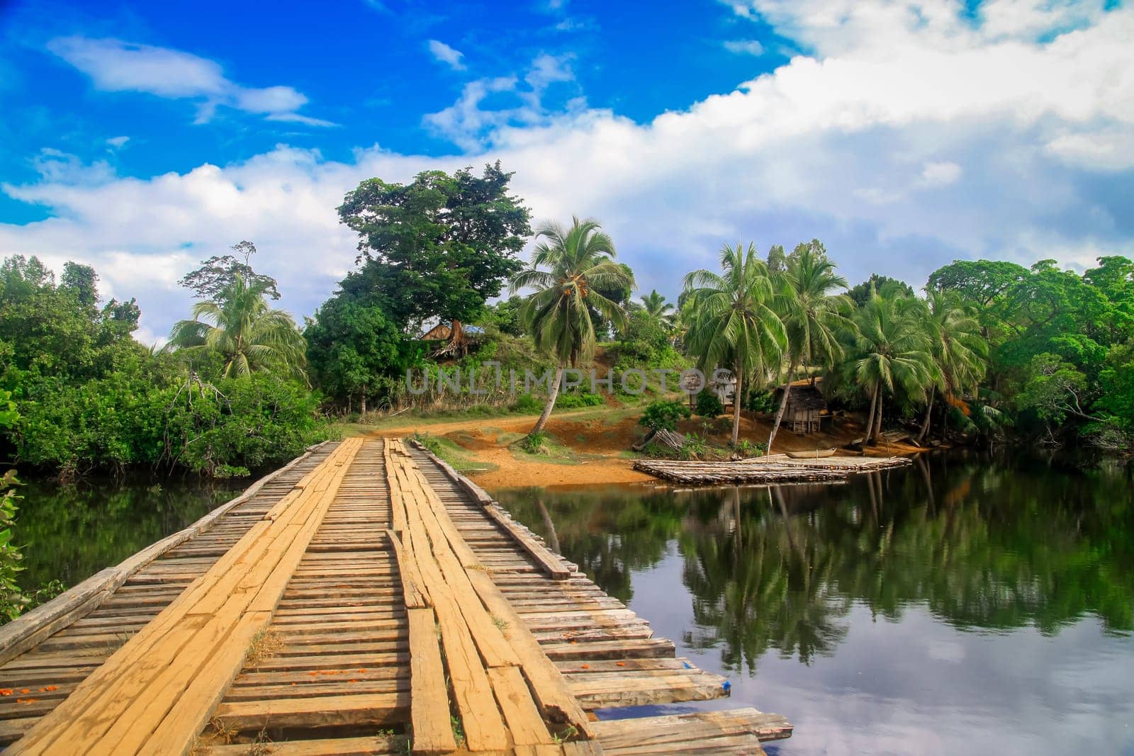 Bridge over wide river in tropical northern Madagascar