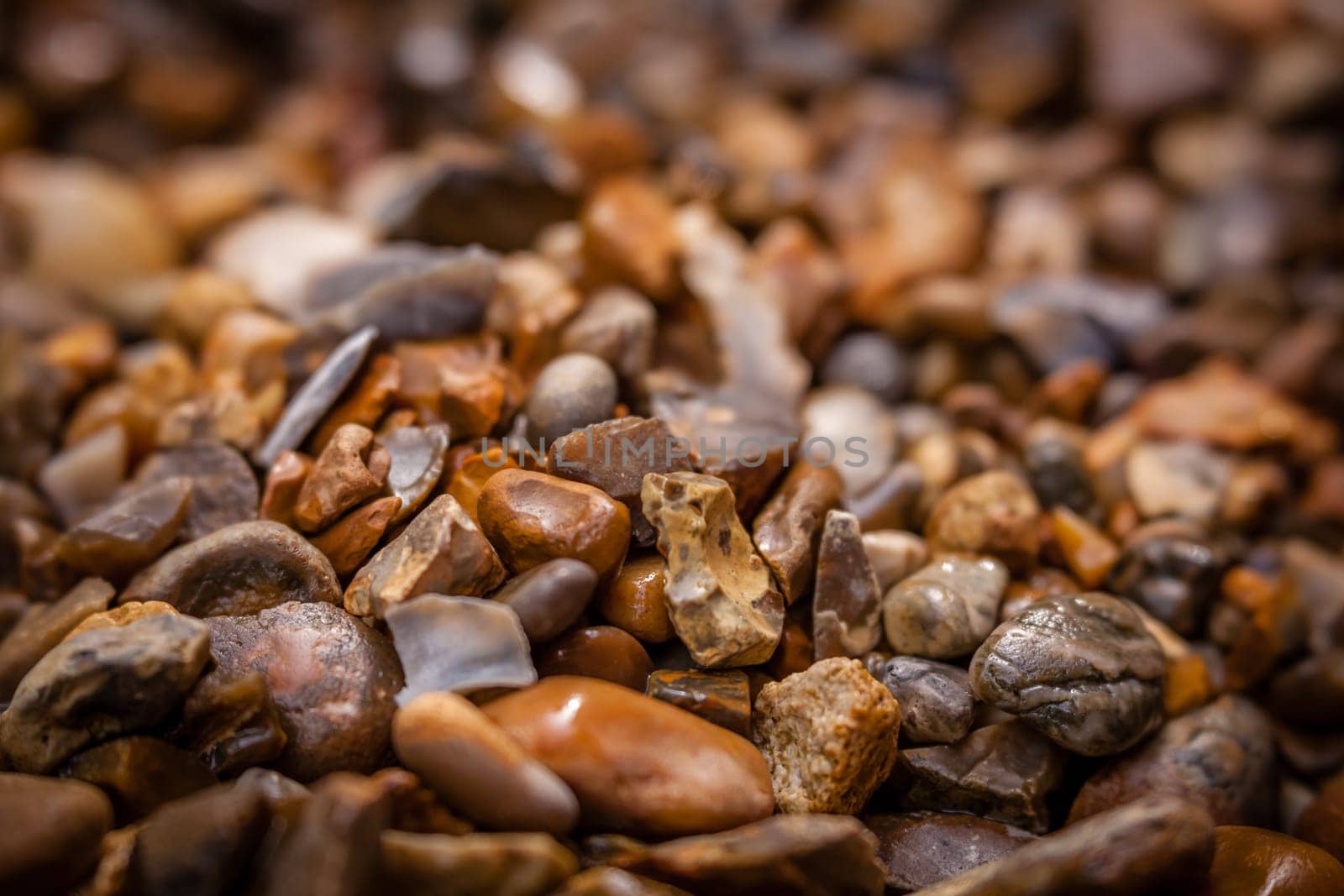 Soft focused blurred picture of a peebles on the ground in the garden