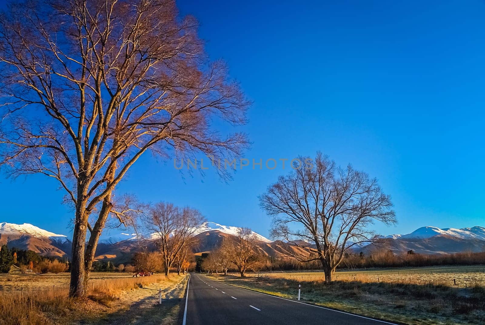 Road through the beautiful mountain scenery on the road to Mt Cook in New Zealand