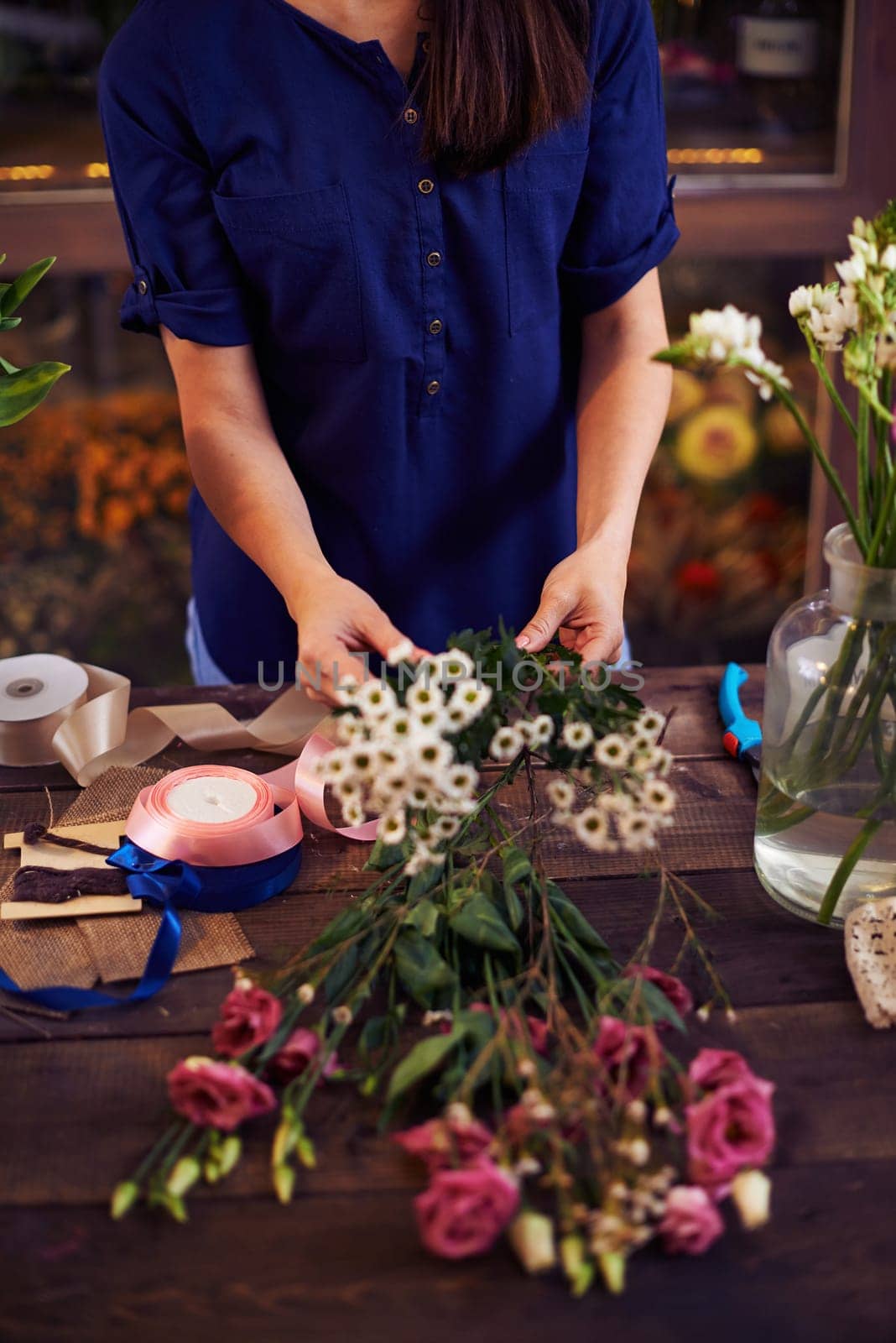 Woman making bouquet
