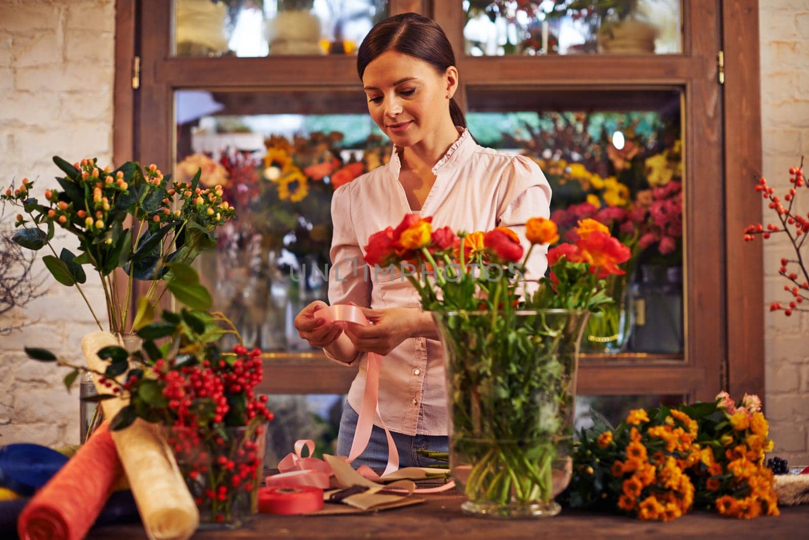 Flower girl working with flowers