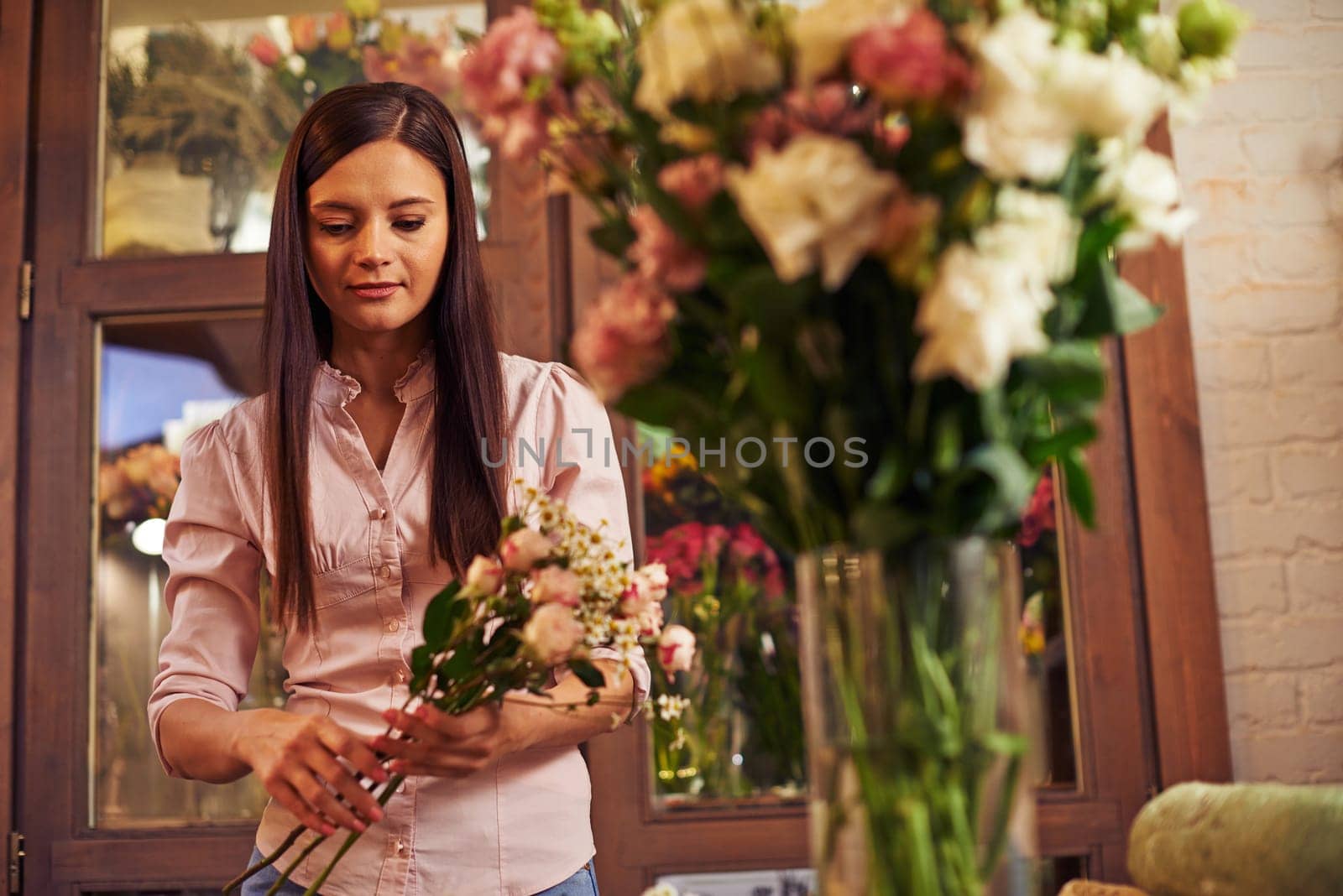 Young woman working at flower shop