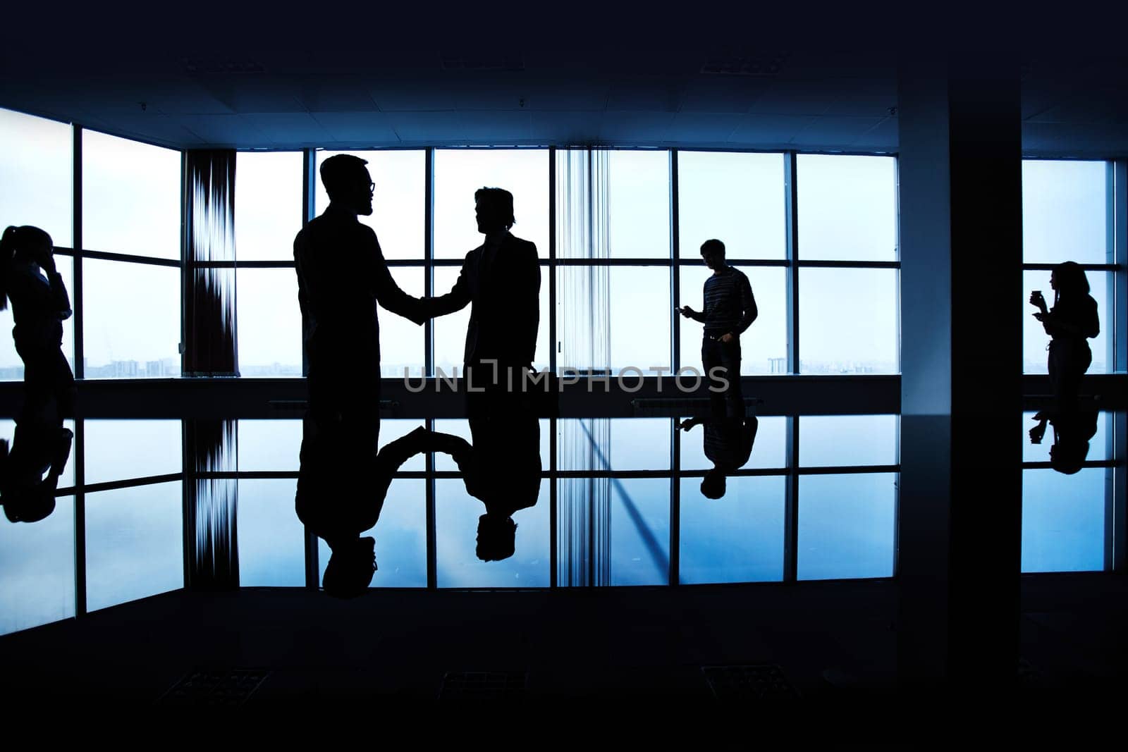 Silhouettes of people in the dark