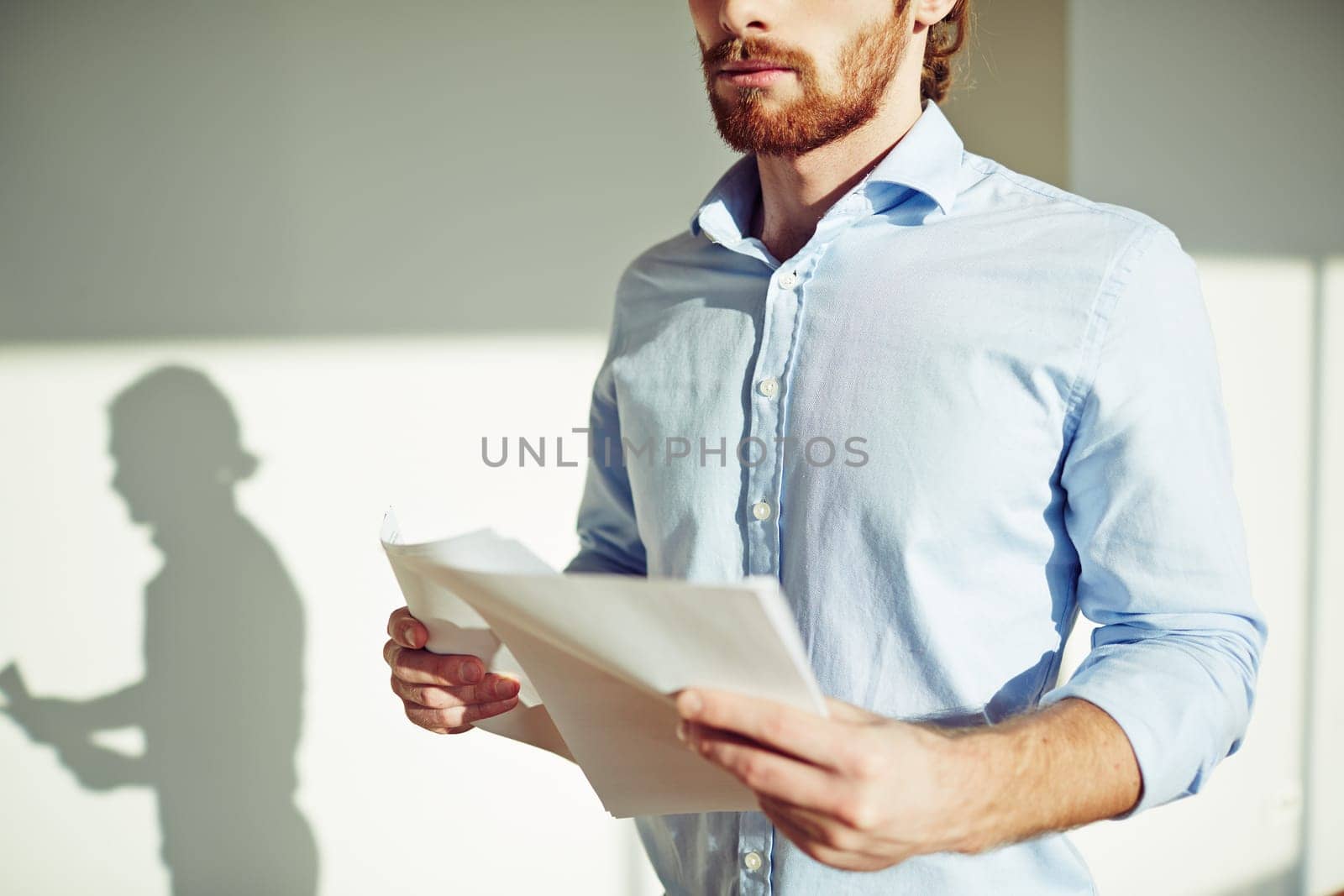 Young businessman with contract