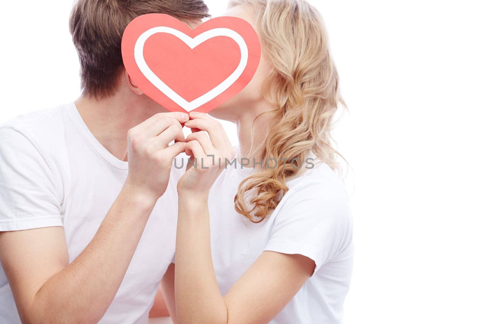Kissing couple with a heart
