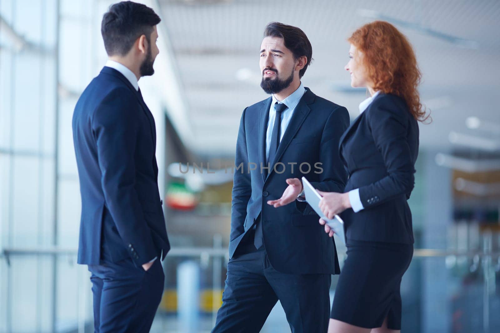 Three colleagues communicating