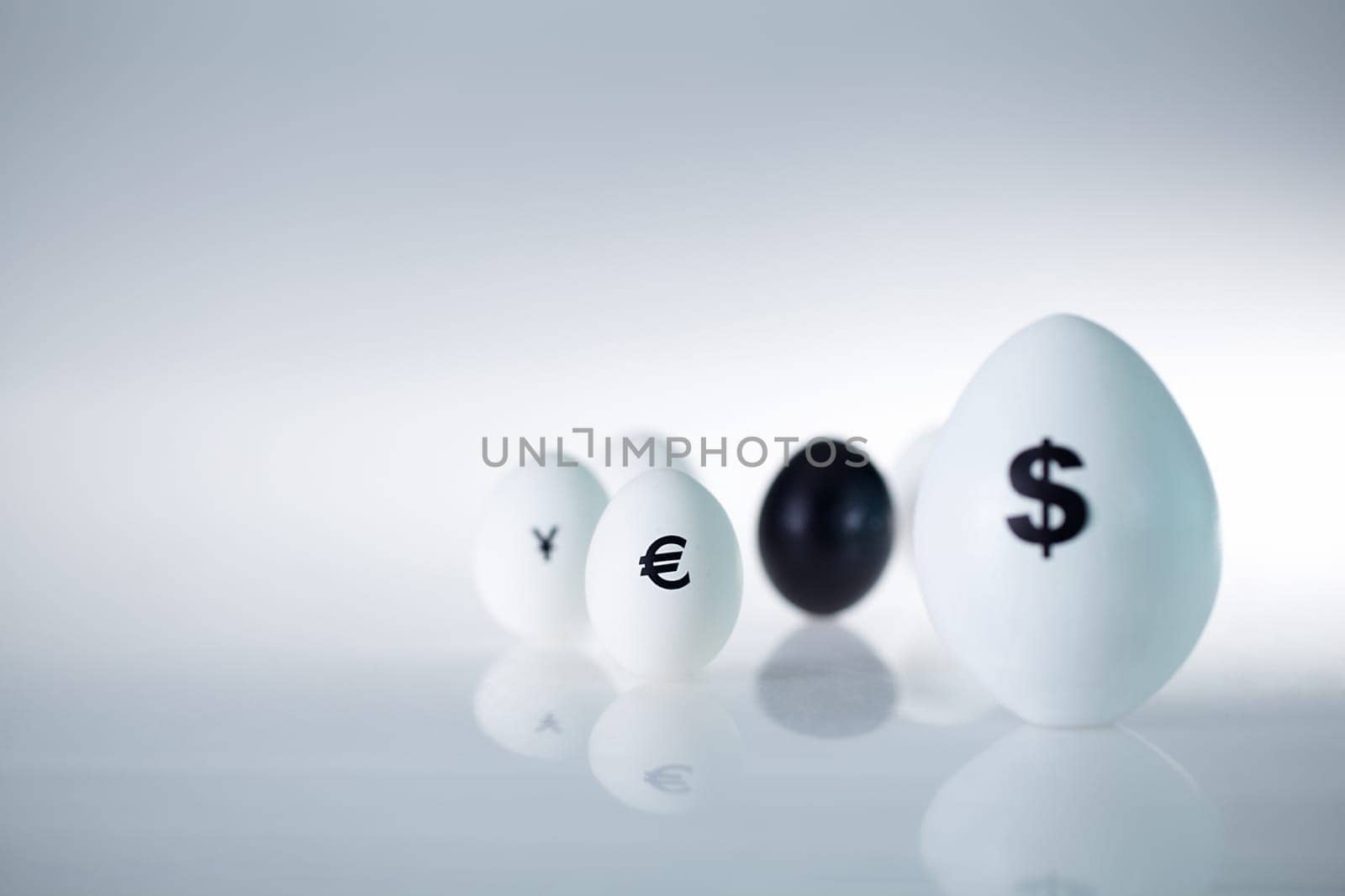 Eggs with signs of currencies