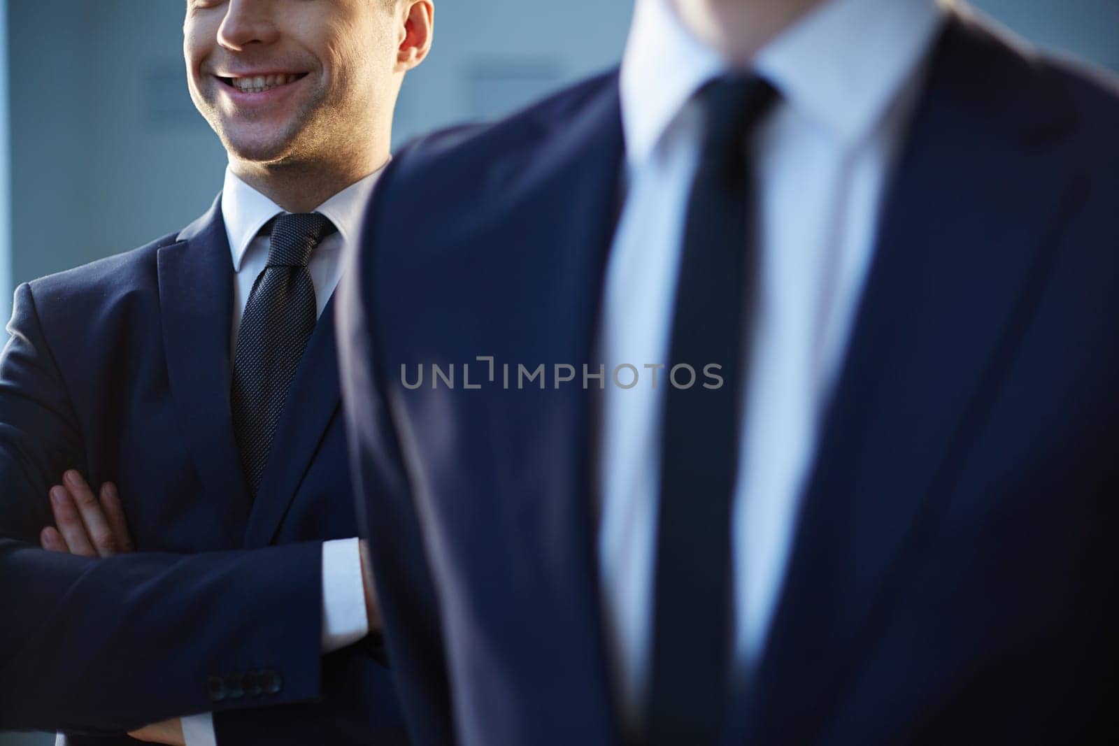 Close-up of smiling man in formalwear