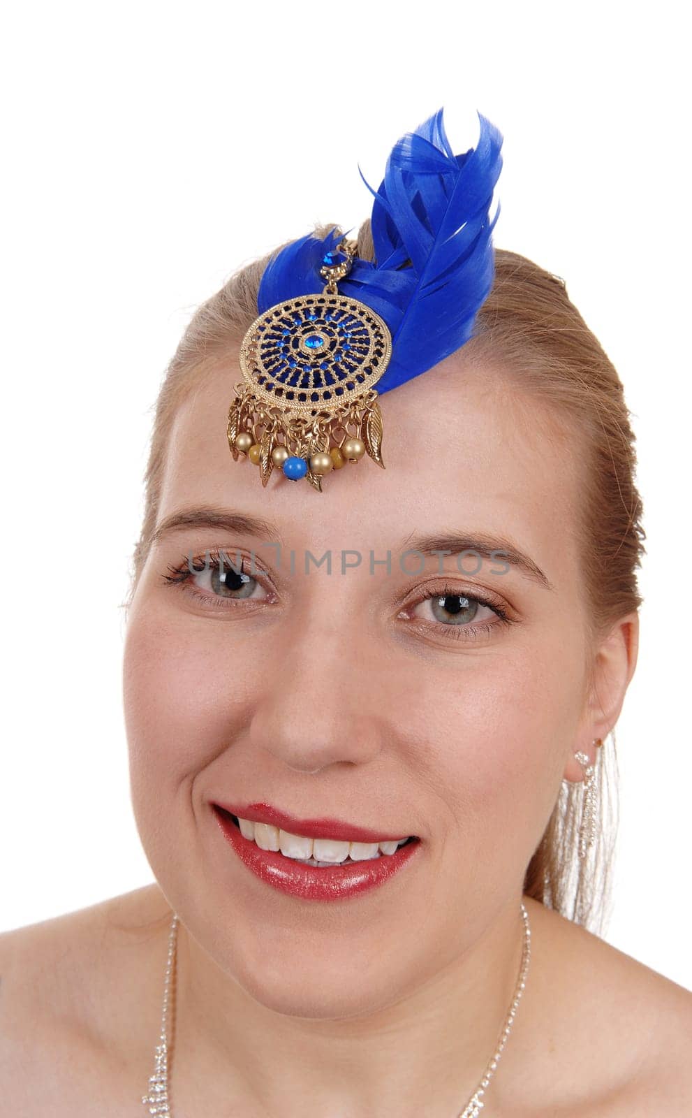 Beautiful young woman in close smiling pretty and .jewellery on her forehead, isolated for white background.
