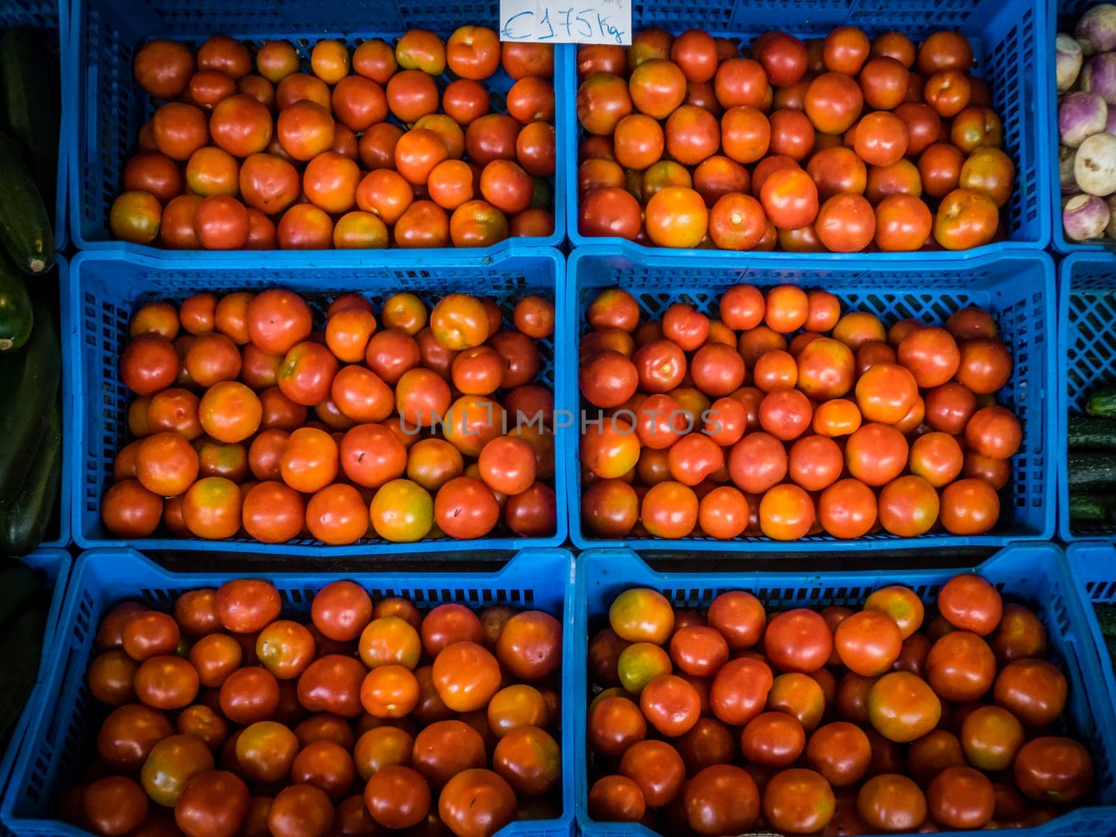 A pile of tomatoes on sale on a market in Ponta Delgada, Azores, Porugal