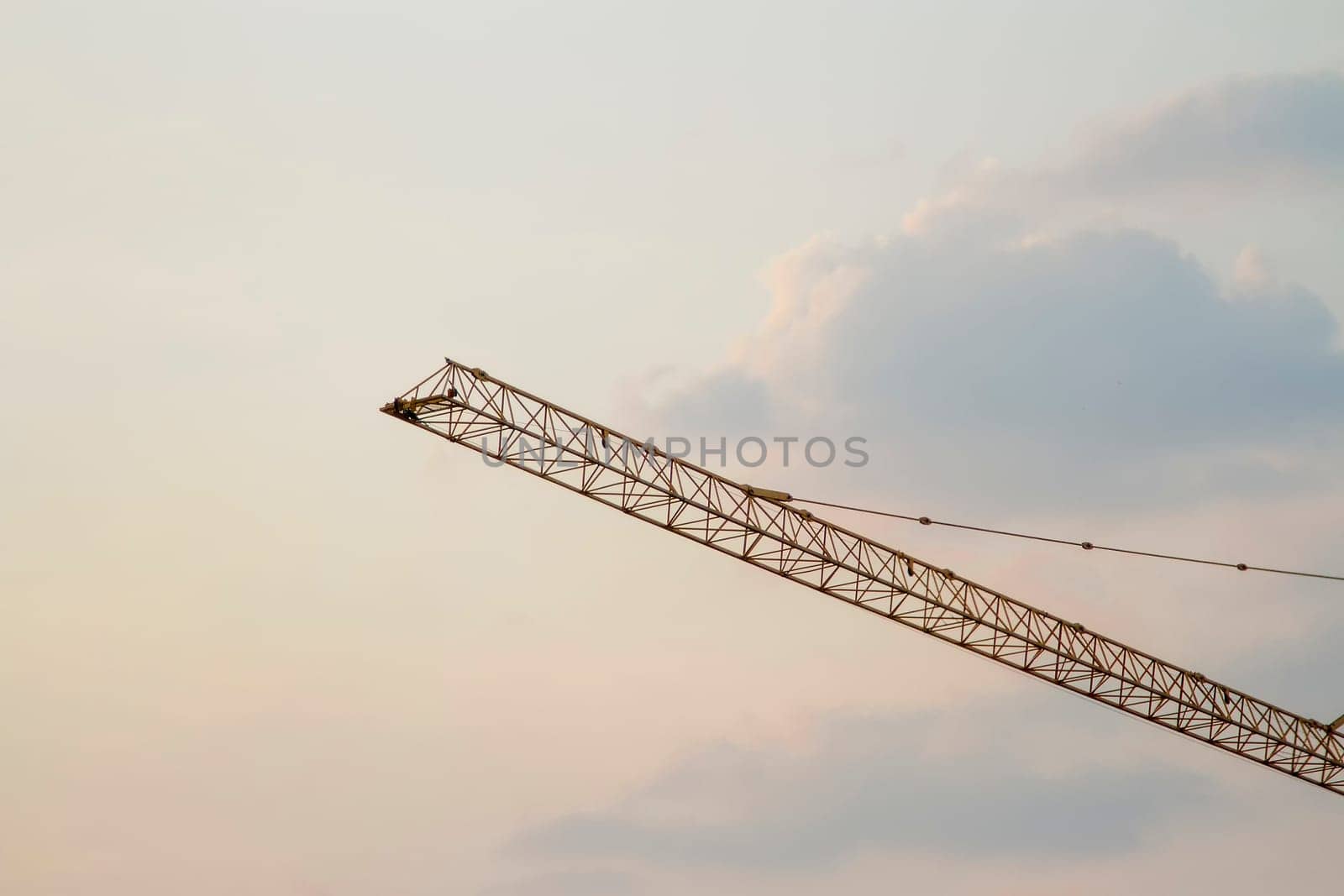 Cranes in everning and sun sky