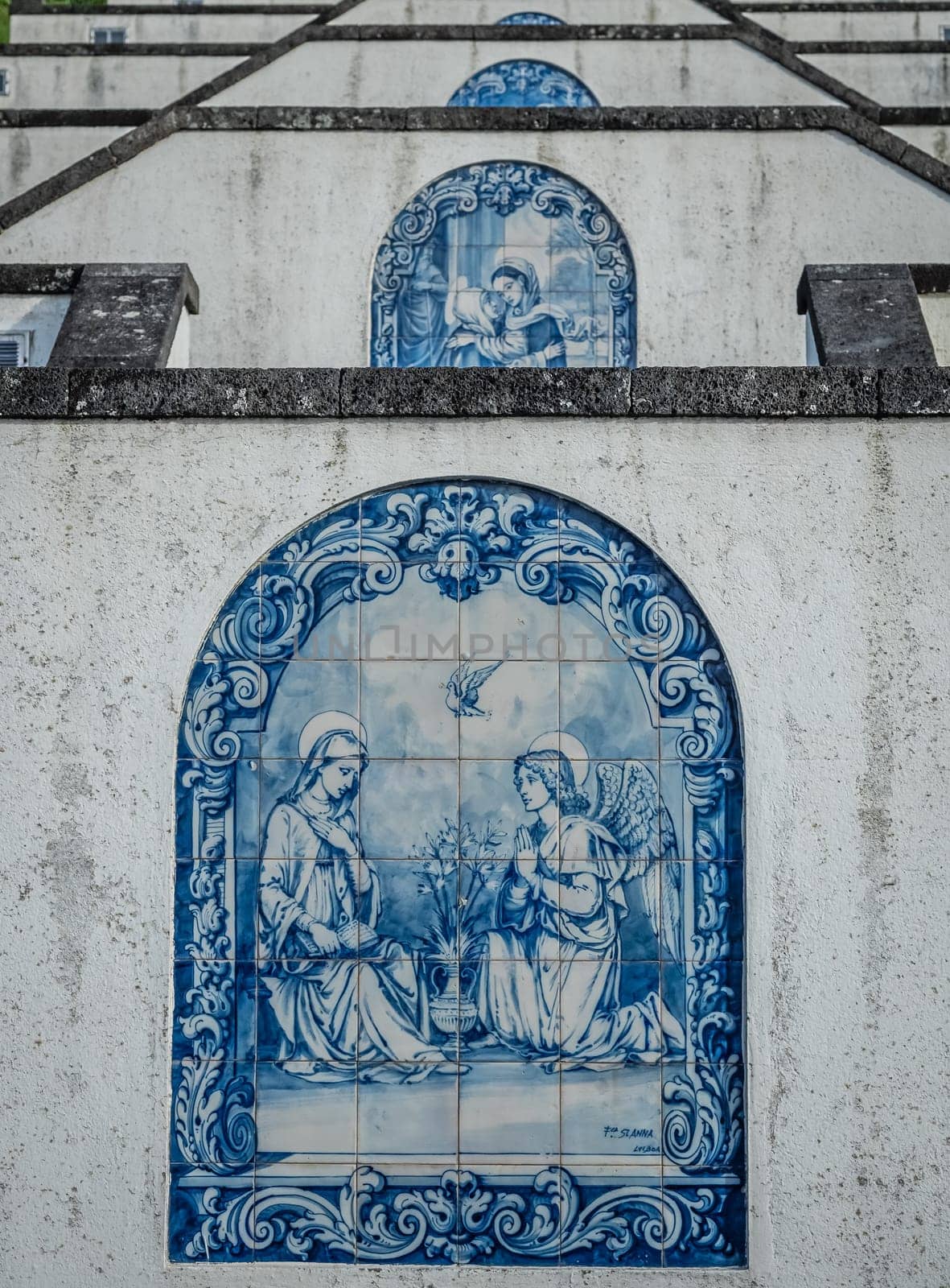 One of many mosaics on the stairs leading to the entrance of the Our Lady of Peace ( Nossa Senhora da Paz ) chapel above the city of Vila Franca do Campo in Sao Miguel, Azores, Portugal