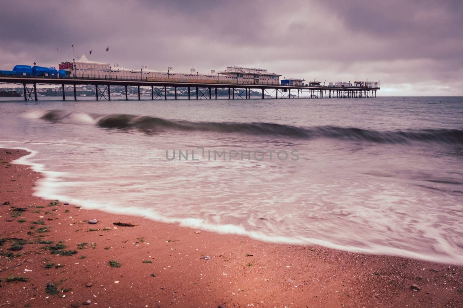 Pier on Paignton beach near Torquay in Devon on a stormy day
