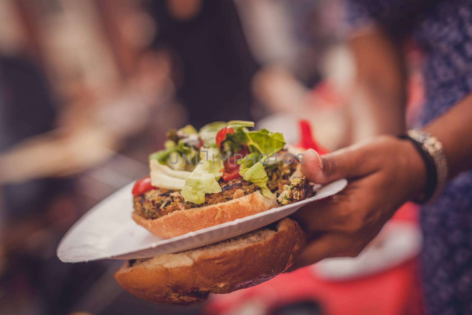 BBQ burgers and grilled corn during barbecue outdoors