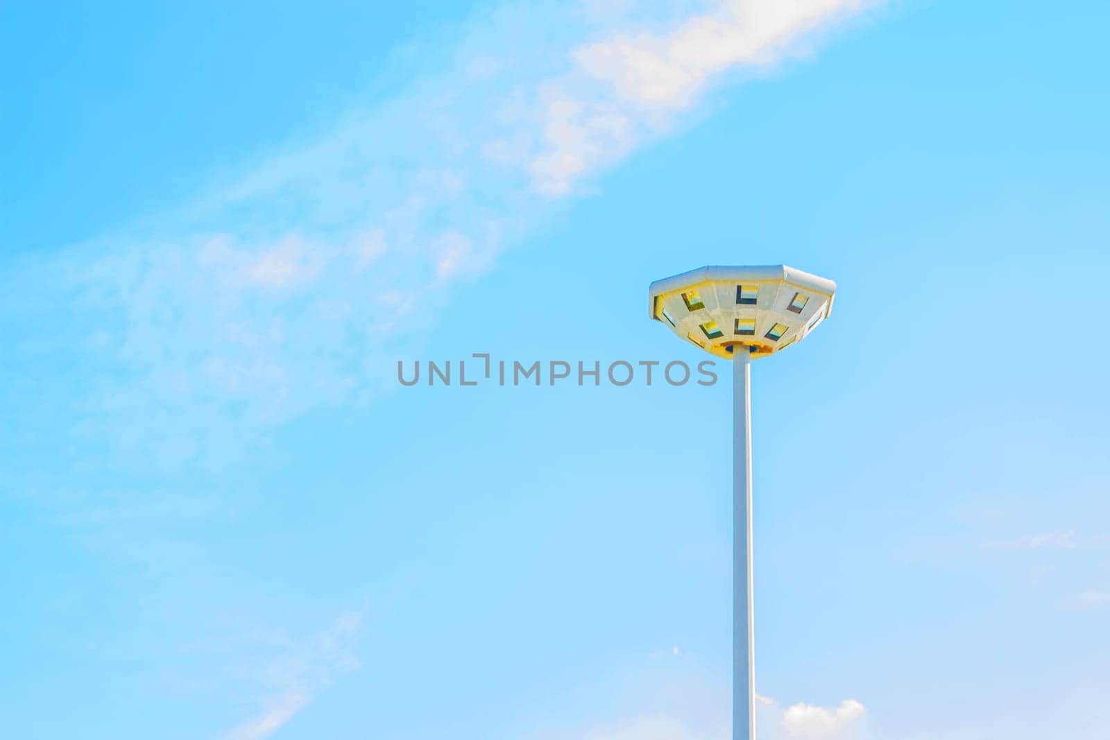 Light pole in the blue sky