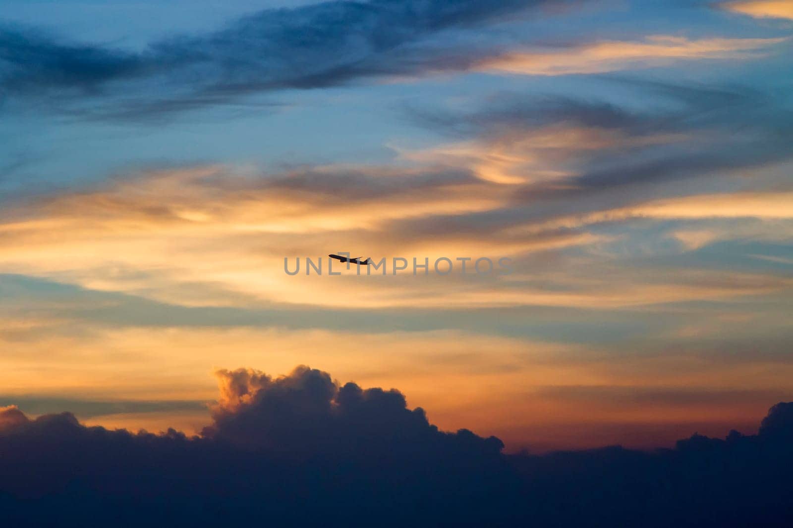 Plane with the evening sky