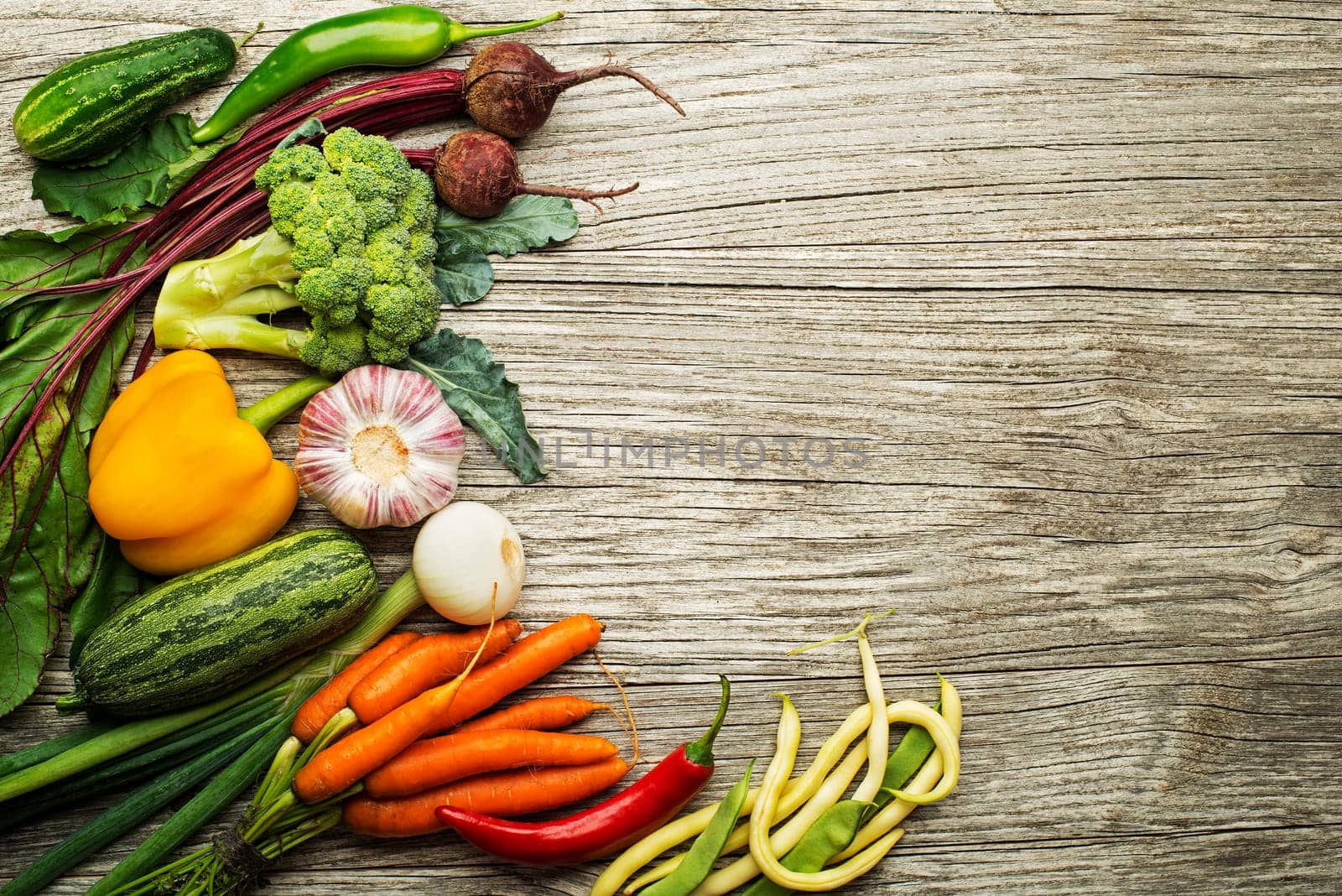 Various of fresh vegetables and ingredients on wooden rustic background