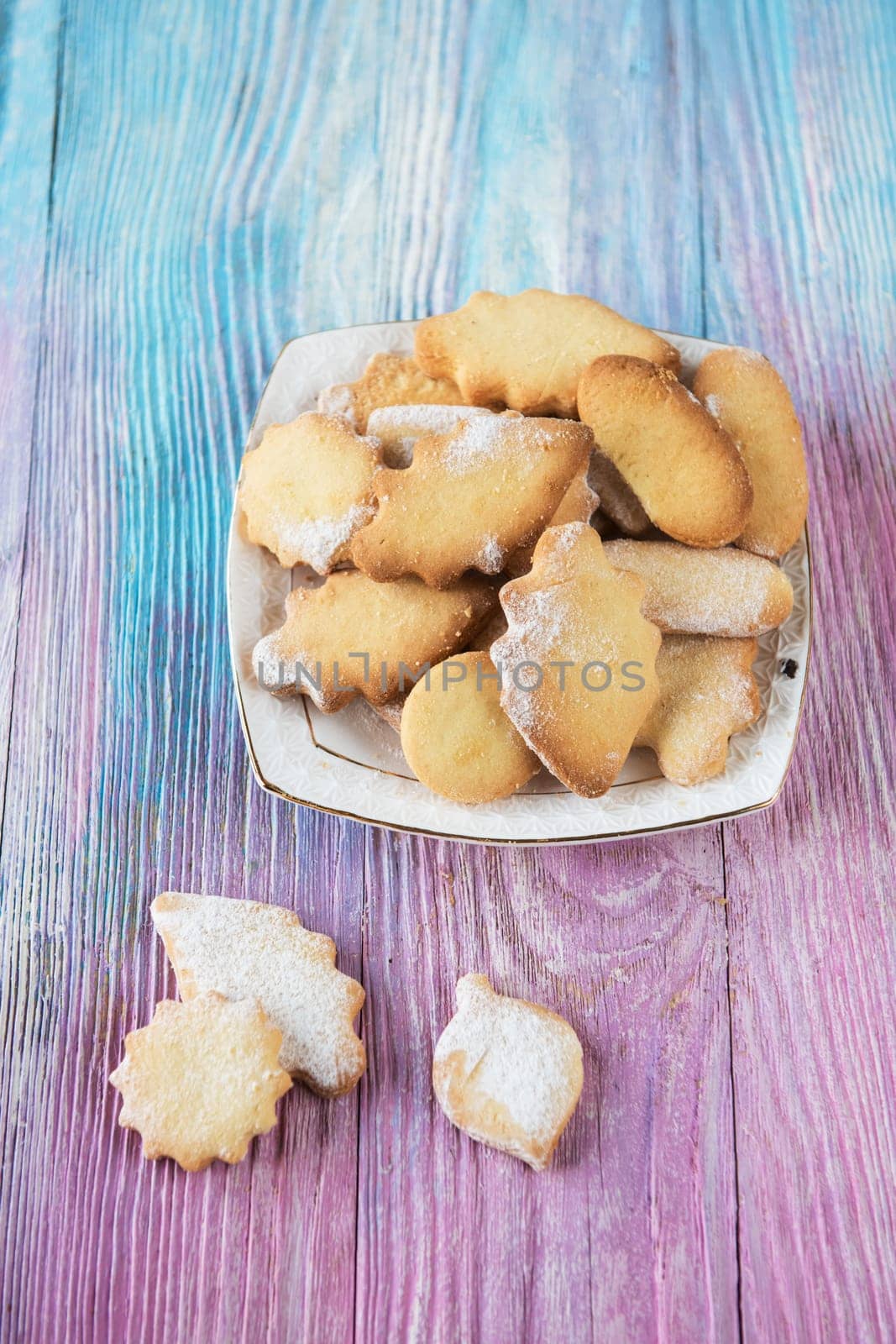 Tasty different cakes set on a color gradient background