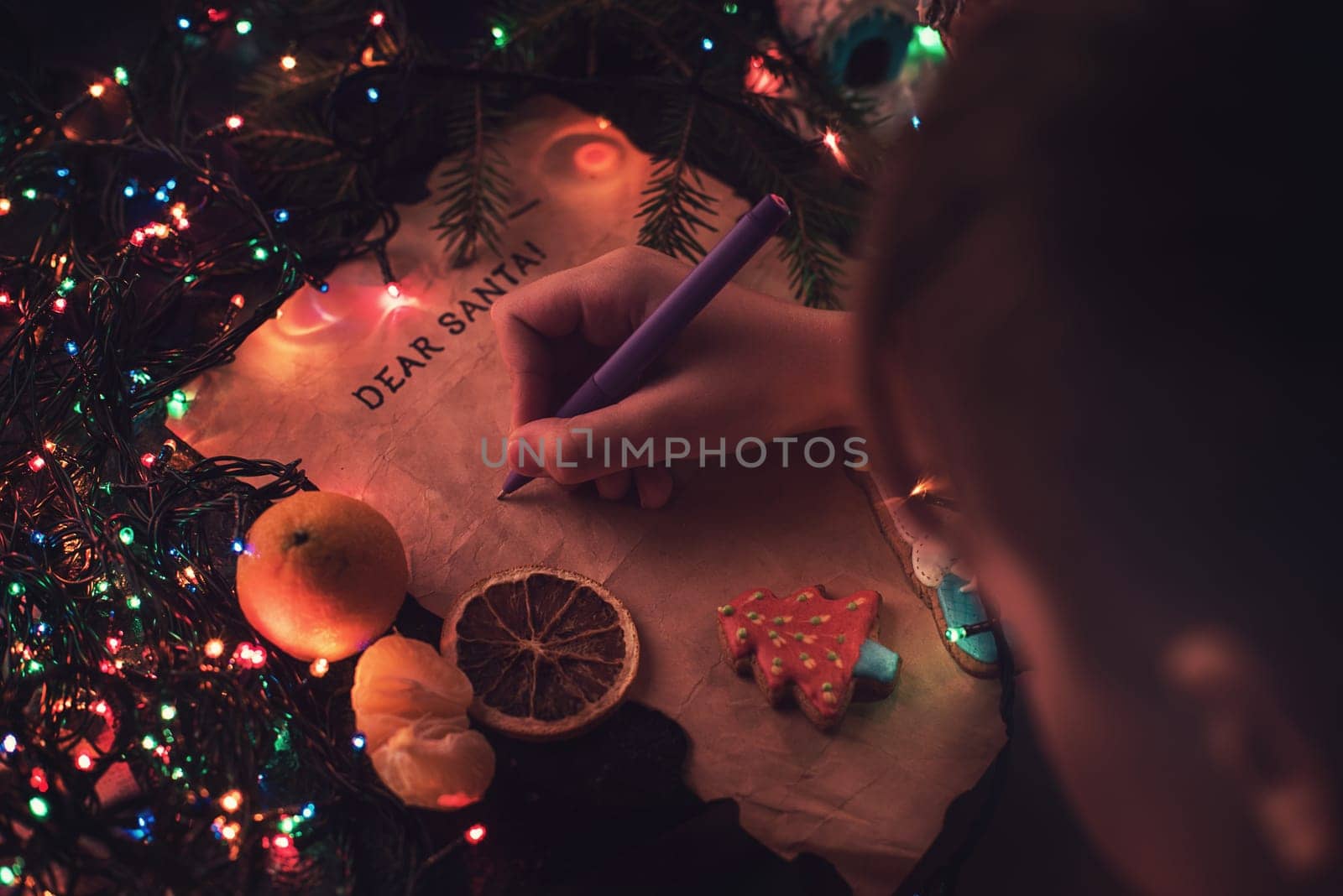 Boy writes a letter to Santa, cristmas background