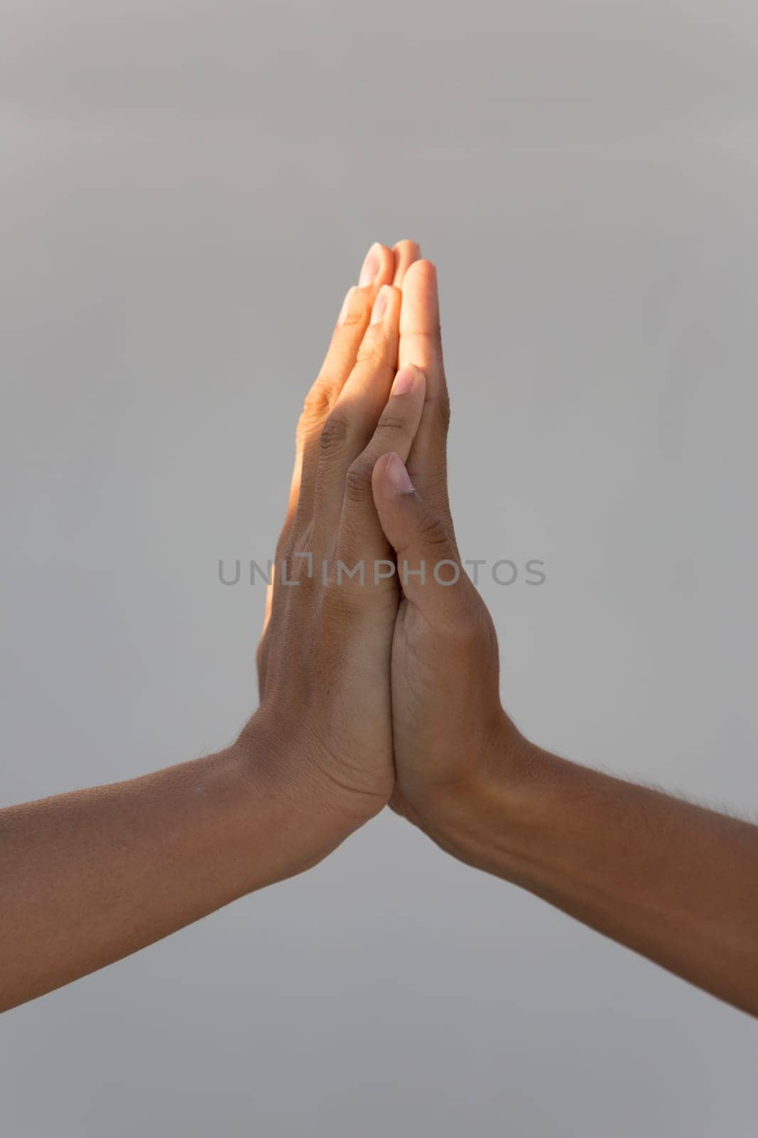 Two hand areas on top of each other