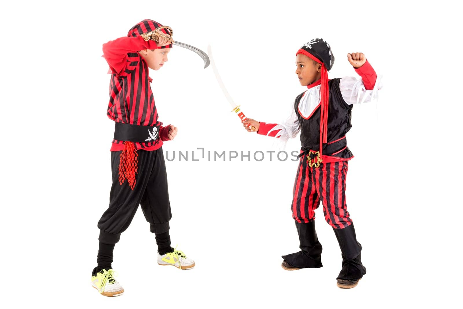Young boys in pirate costumes for Halloween