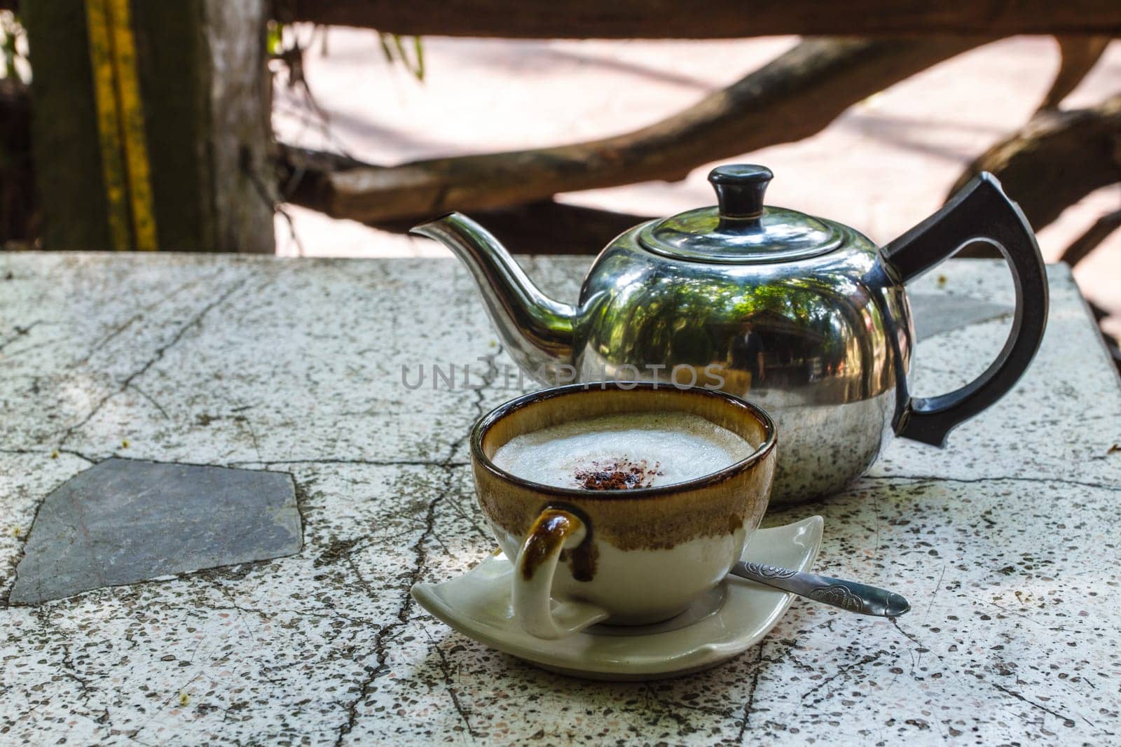 Close up cappuccino coffee on marble table