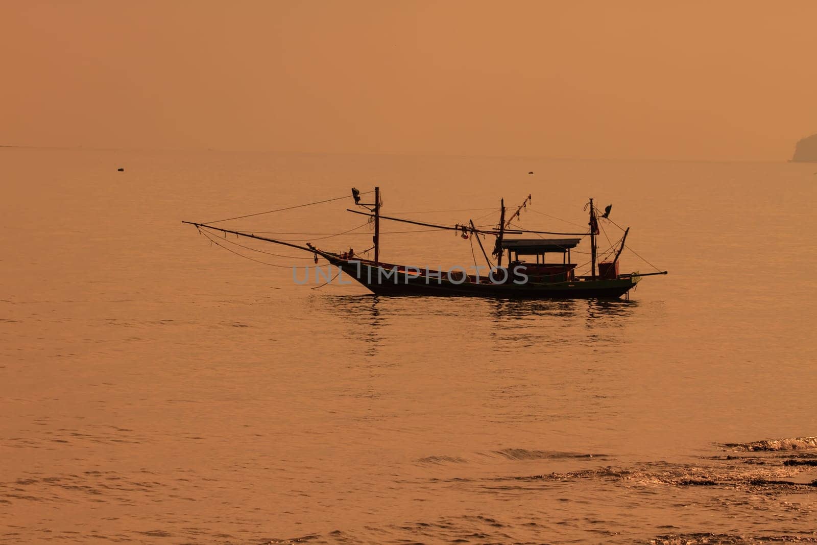 Fishing boat on the sea in summer