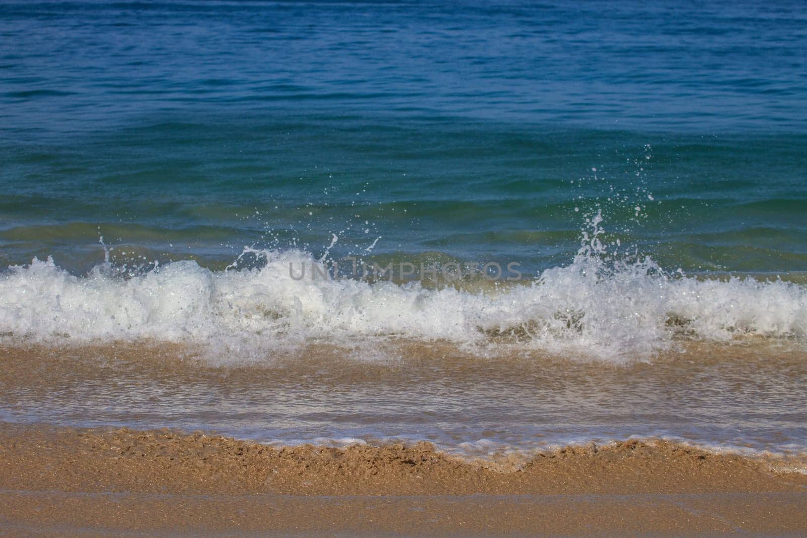Moving of surf in the sea,Soft wave of the sea on the sandy beach